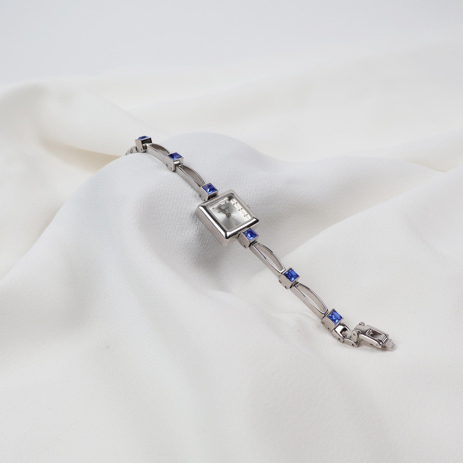 Vintage Silver Nine West Bracelet Watch with Blue Gem Embellishments