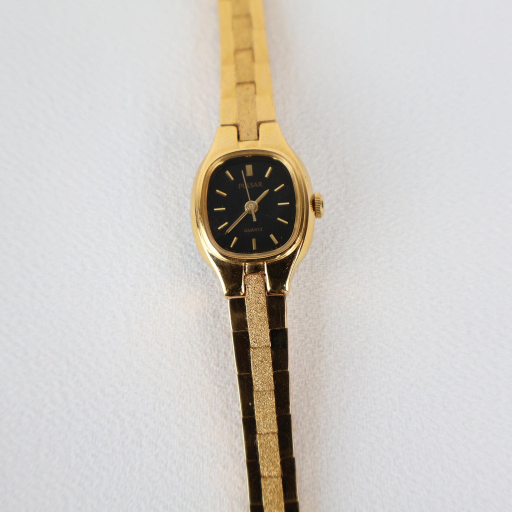 Vintage Black and Gold Pulsar Watch