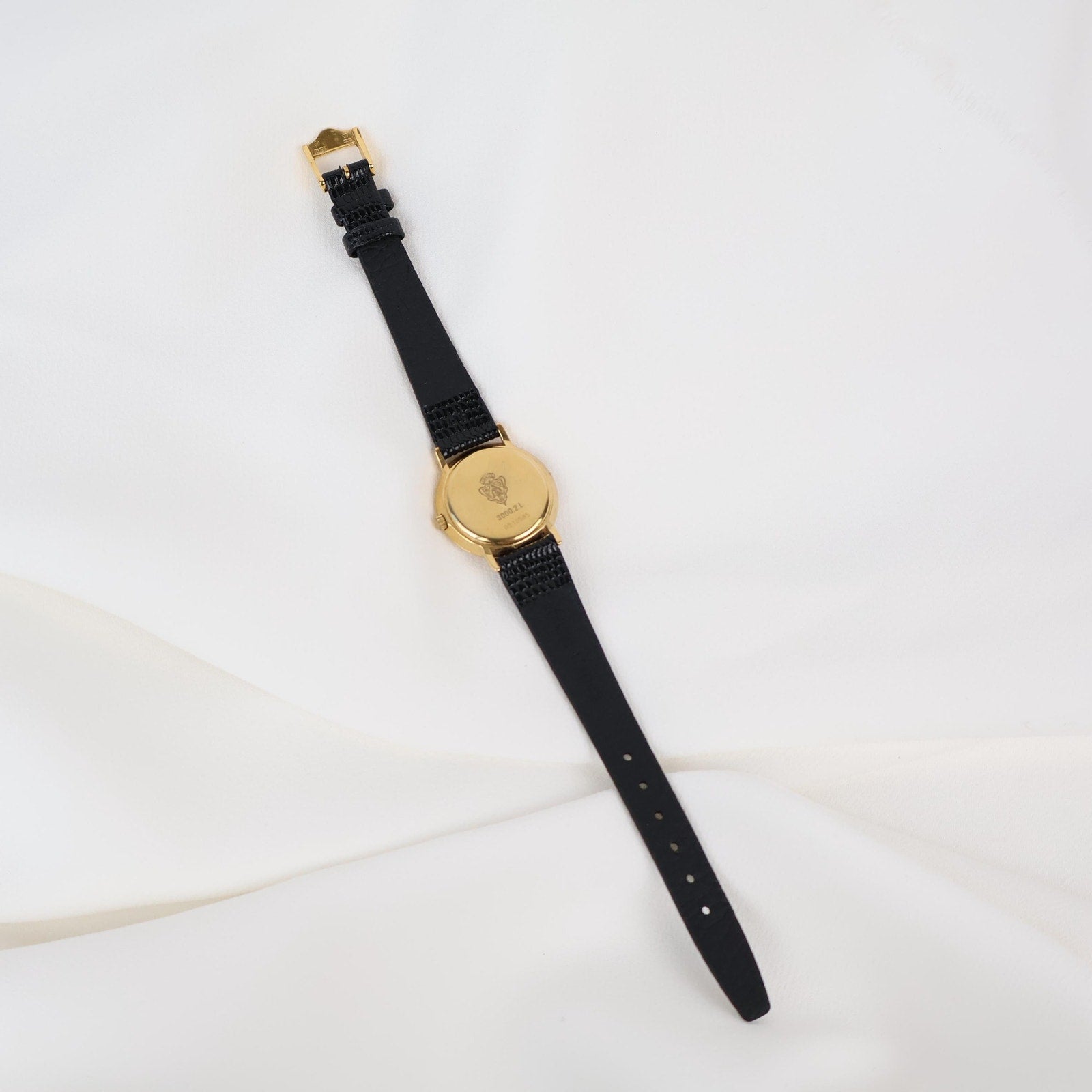 Stunning Vintage Gold Gucci Watch with Black Leather