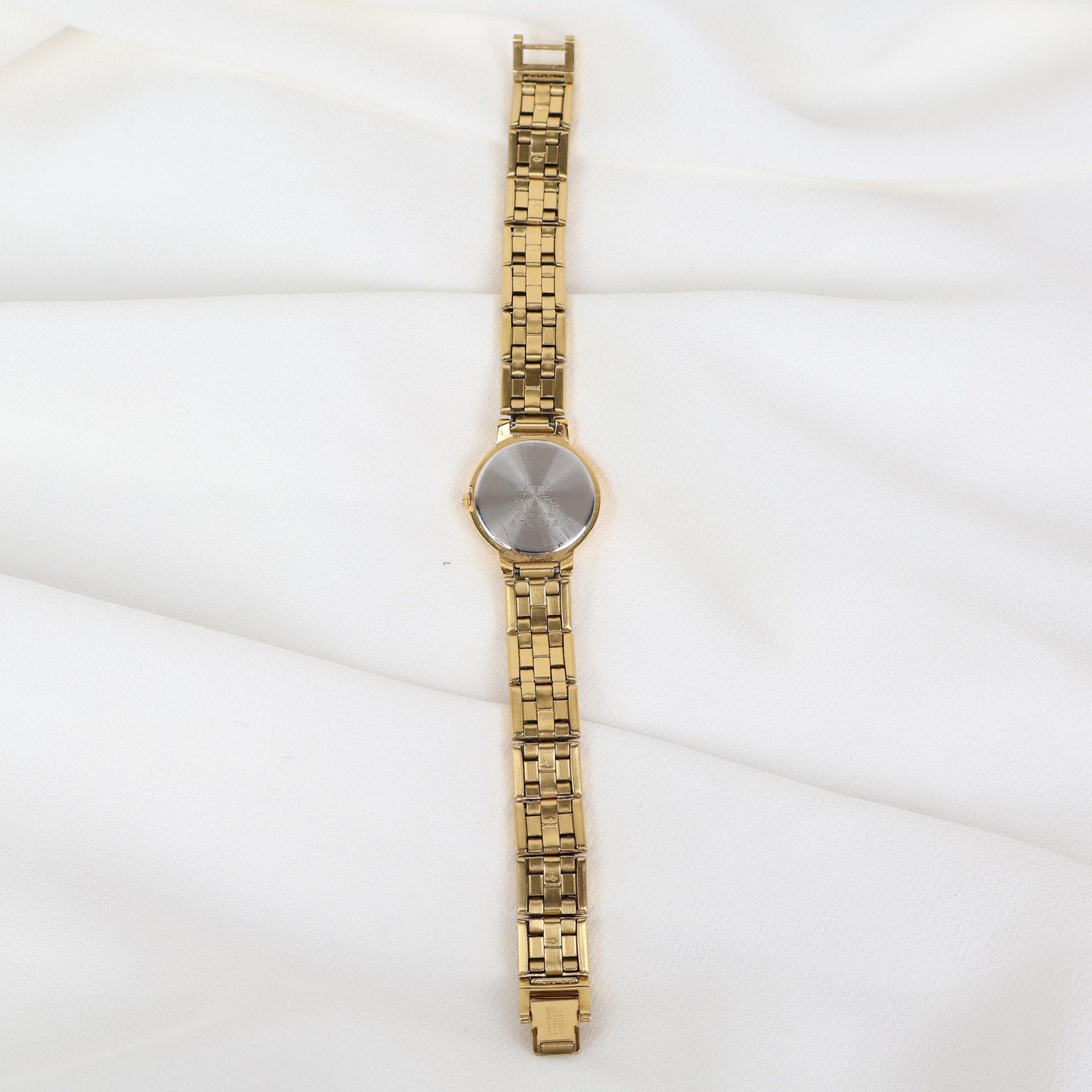 Stunning Vintage Gold Seiko Watch With a Black Round Face