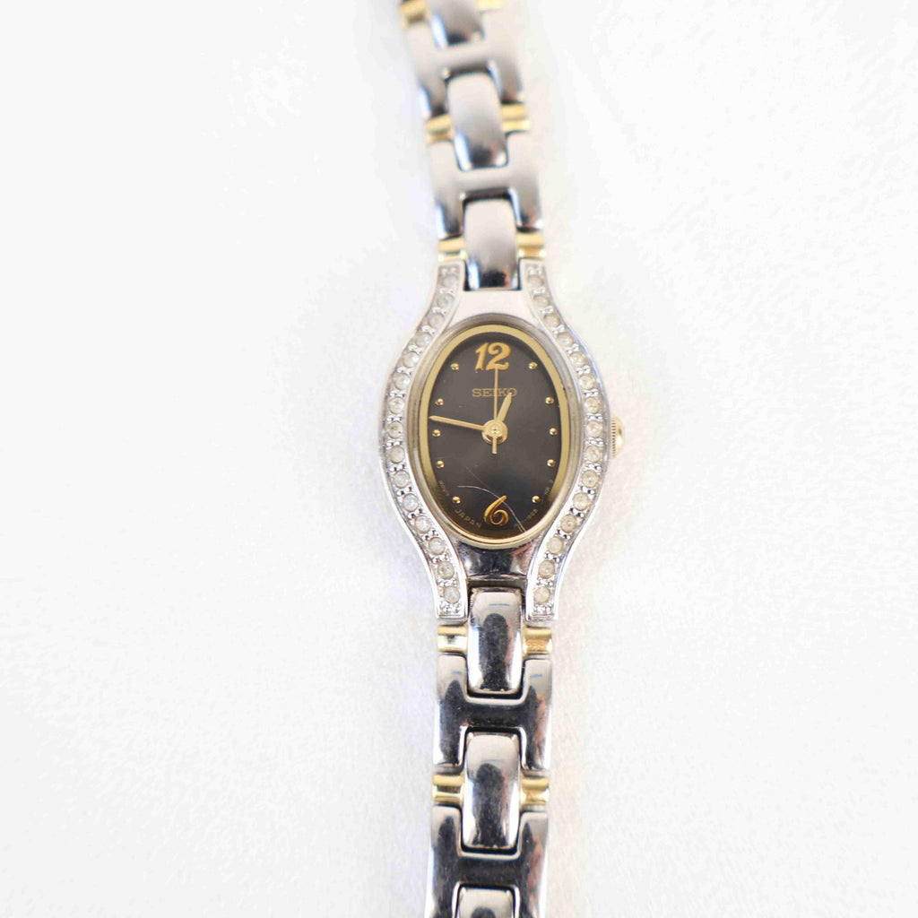 Vintage Two Tone Seiko with a Blue/ Black Face - (Working Battery)