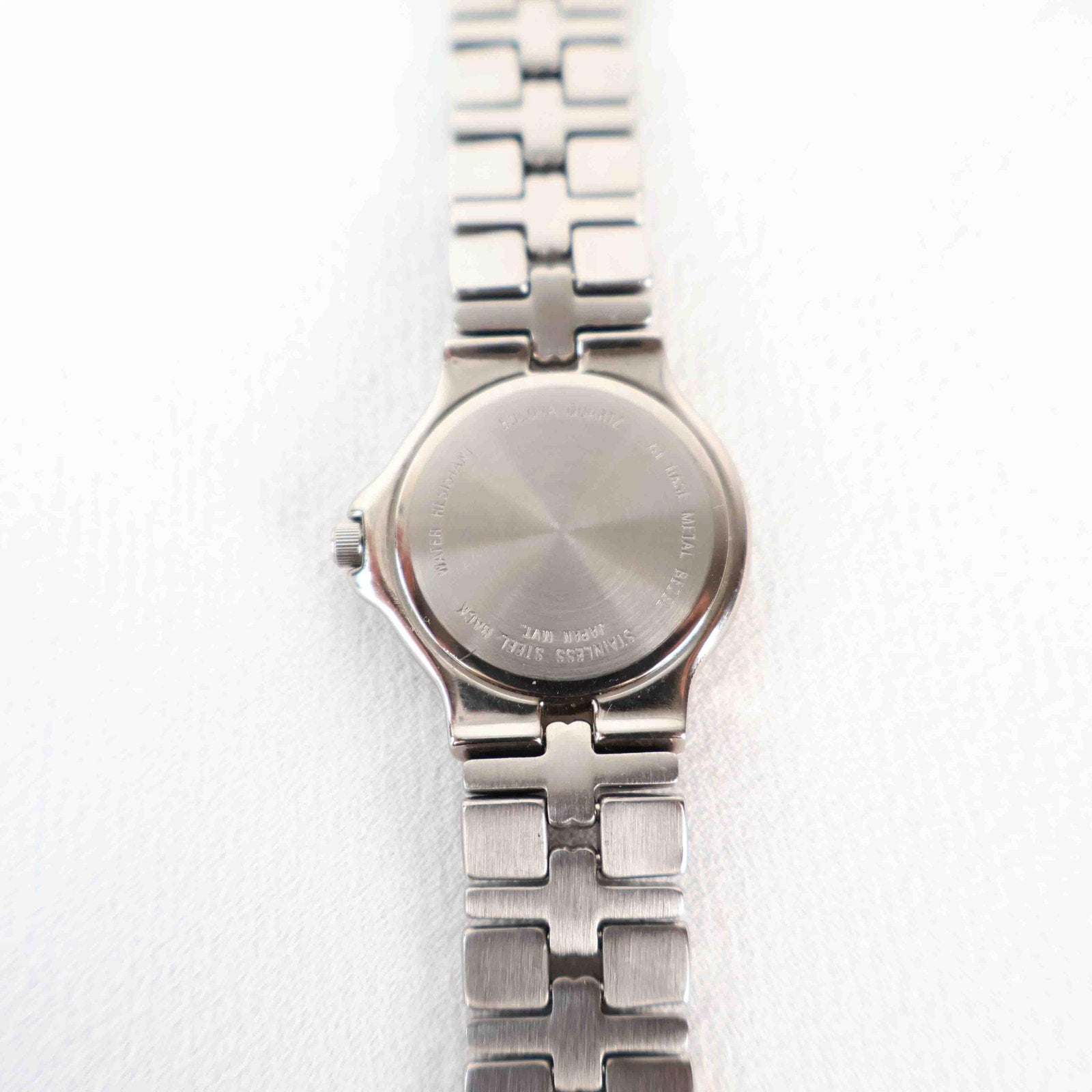 Vintage Silver Tone Bulova Watch with Round White Watch Face