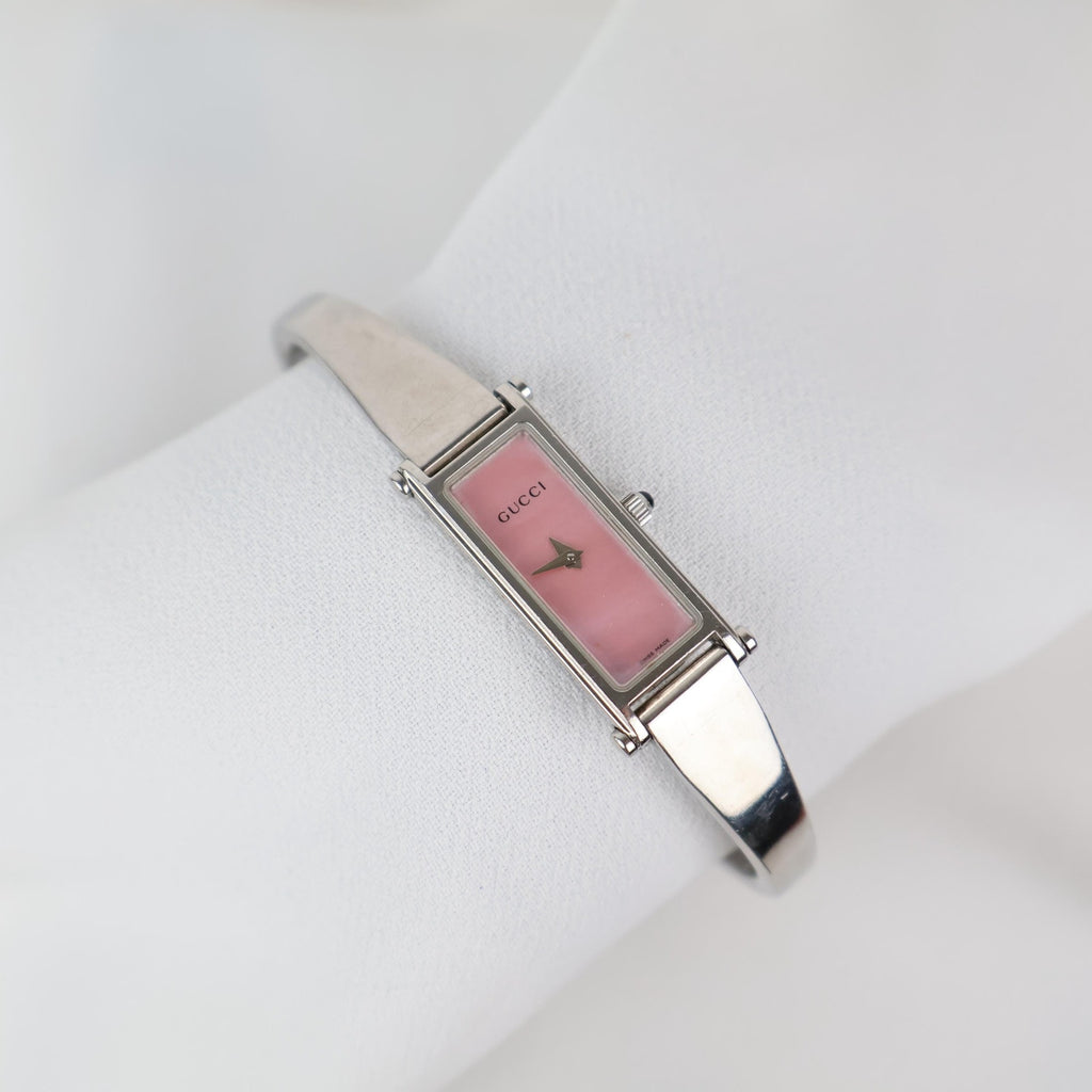 Vintage Silver Gucci Horse-Bit Watch with a Pink Opalesent Face