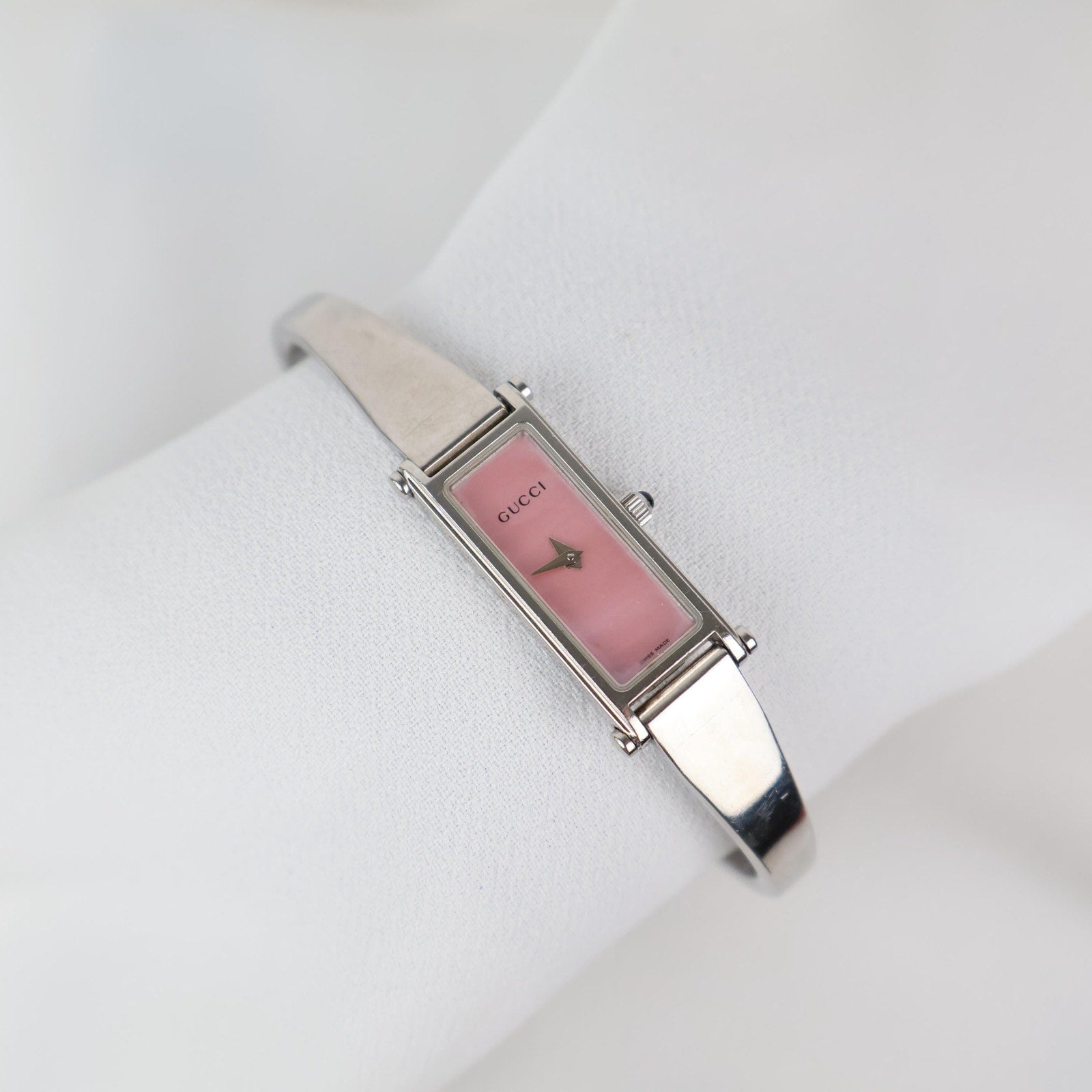 Vintage Silver Gucci Horse-Bit Watch with a Pink Opalesent Face