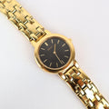 Stunning Vintage Gold Seiko Watch With a Black Round Face