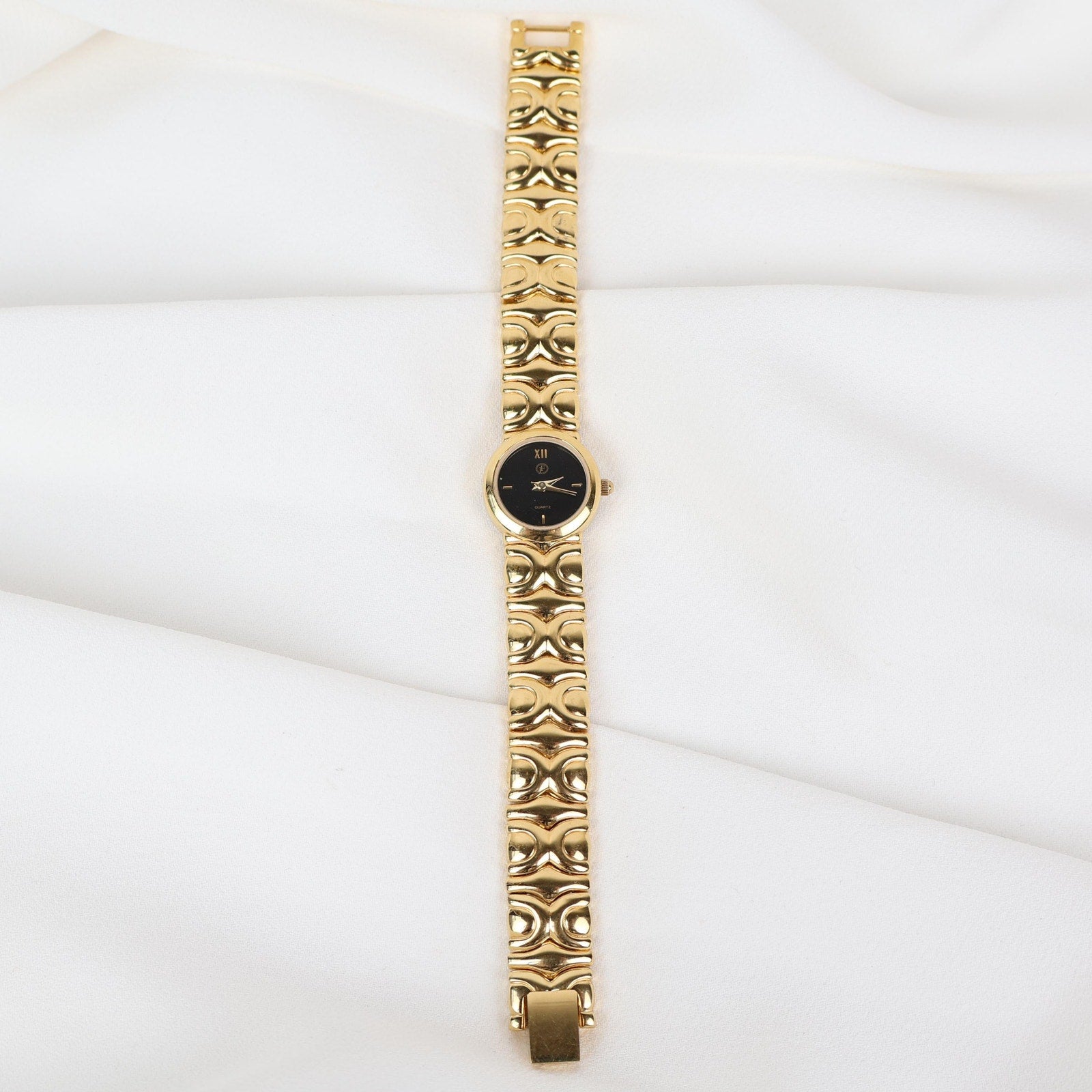 Vintage JF Black and Gold Watch