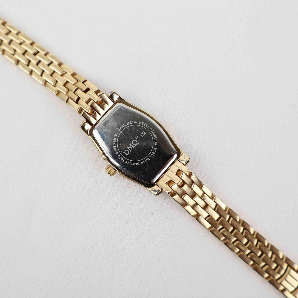 Vintage DMQ Oval Face Watch – Gold Tone Bracelet (Working Battery)
