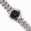 Vintage Silver Tone Bulova Watch with Round Black Watch Face