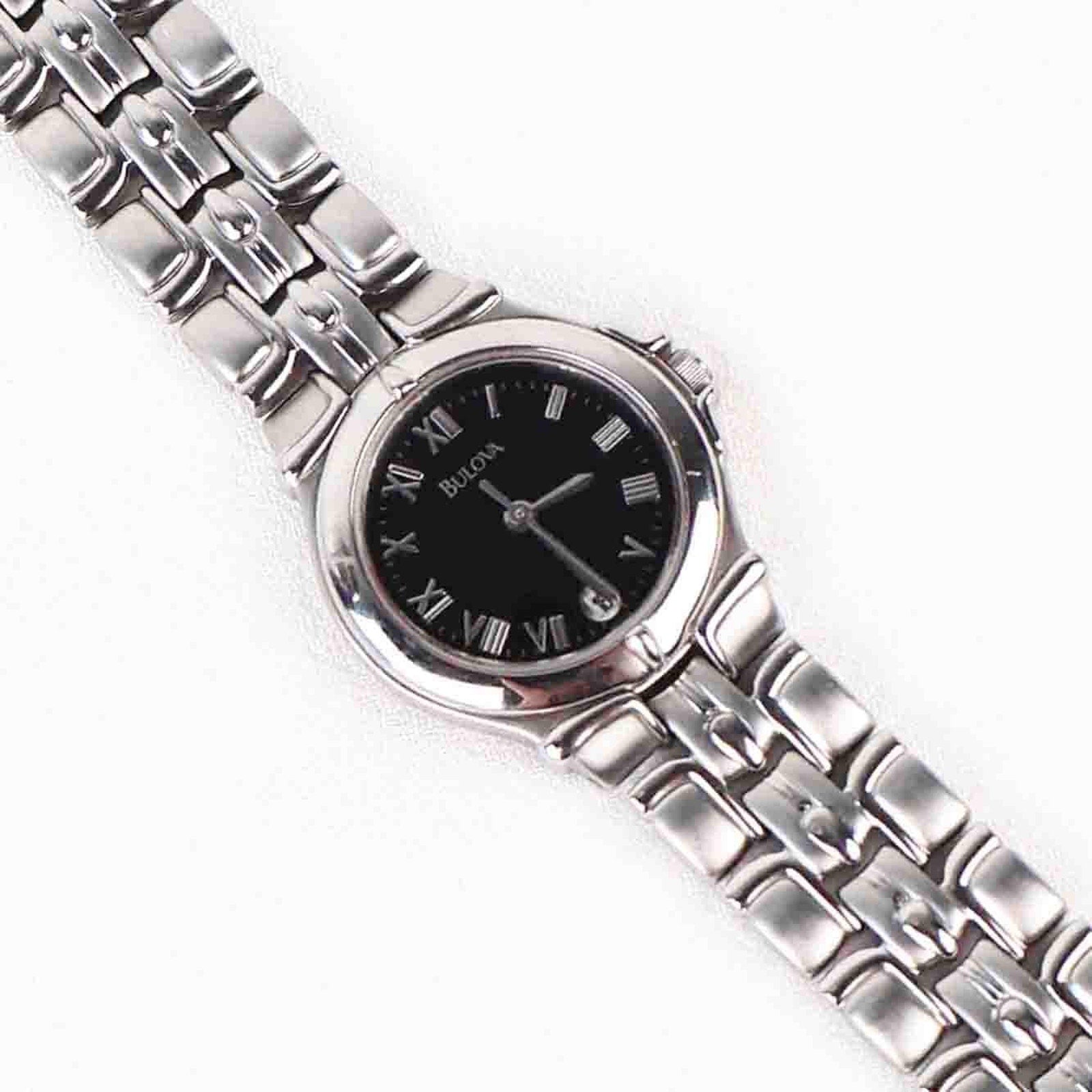 Vintage Silver Tone Bulova Watch with Round Black Watch Face