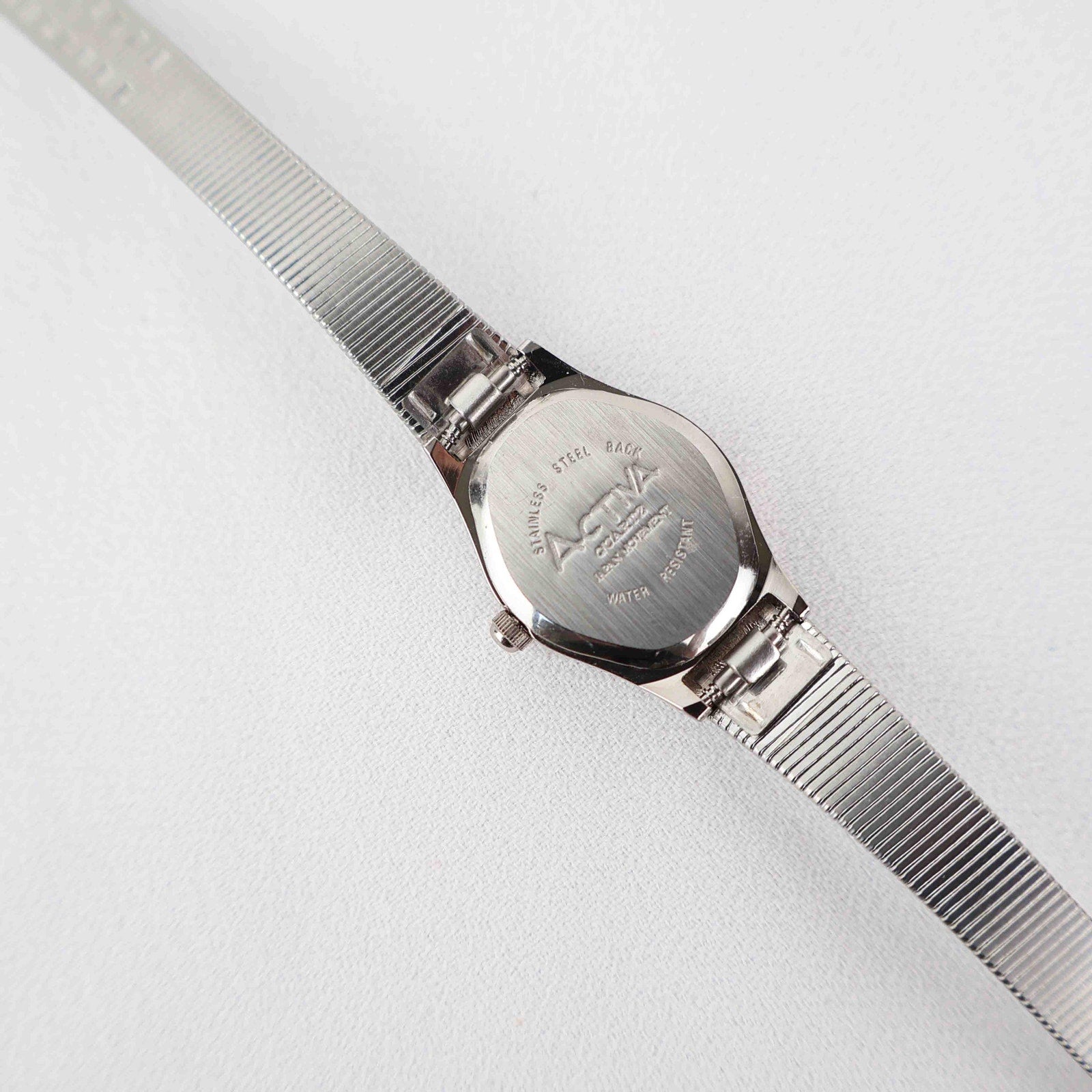 Vintage Activa Silver Tone Quartz Watch with White Face