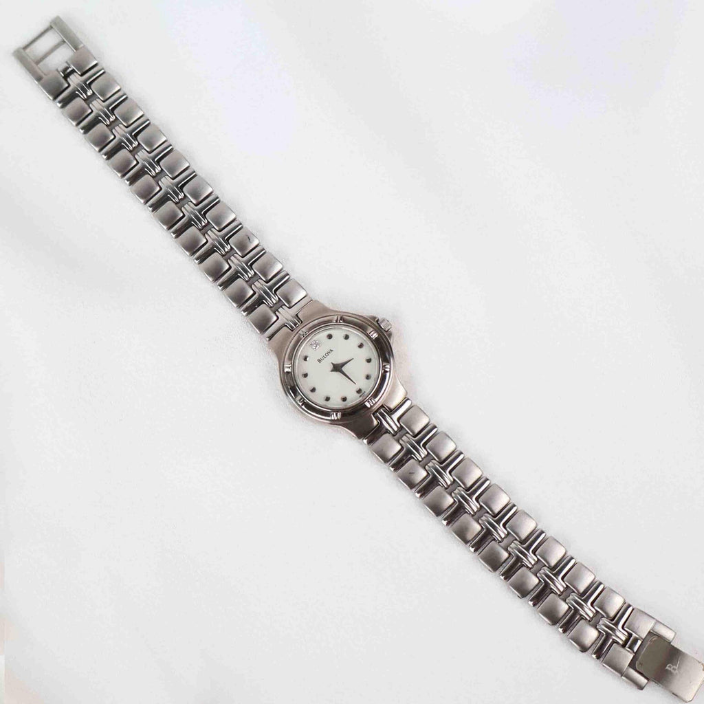 Vintage Silver Tone Bulova Watch with Round White Watch Face