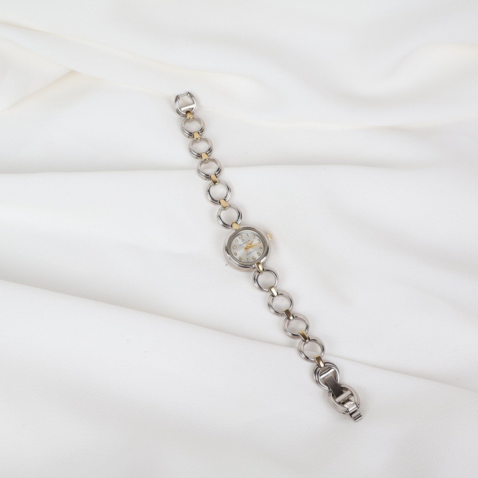 Vintage Two Tone Liz Claiborne Watch with a Round Face and Chain Look