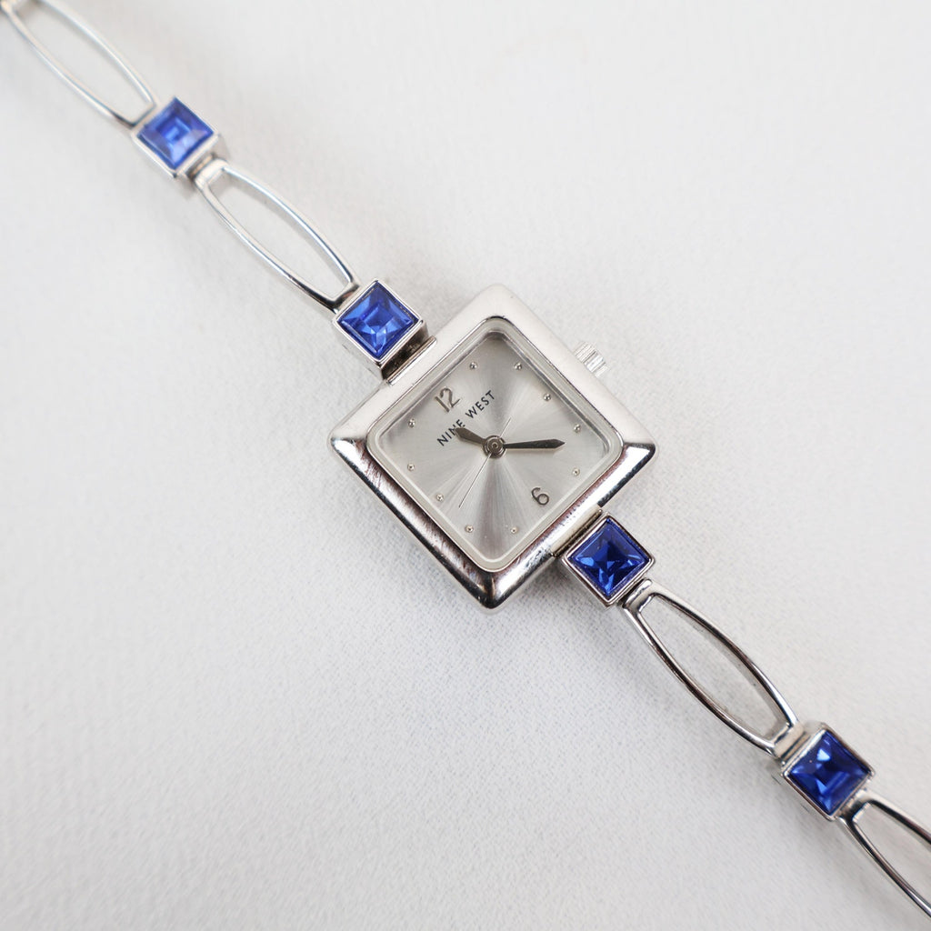 Vintage Silver Nine West Bracelet Watch with Blue Gem Embellishments