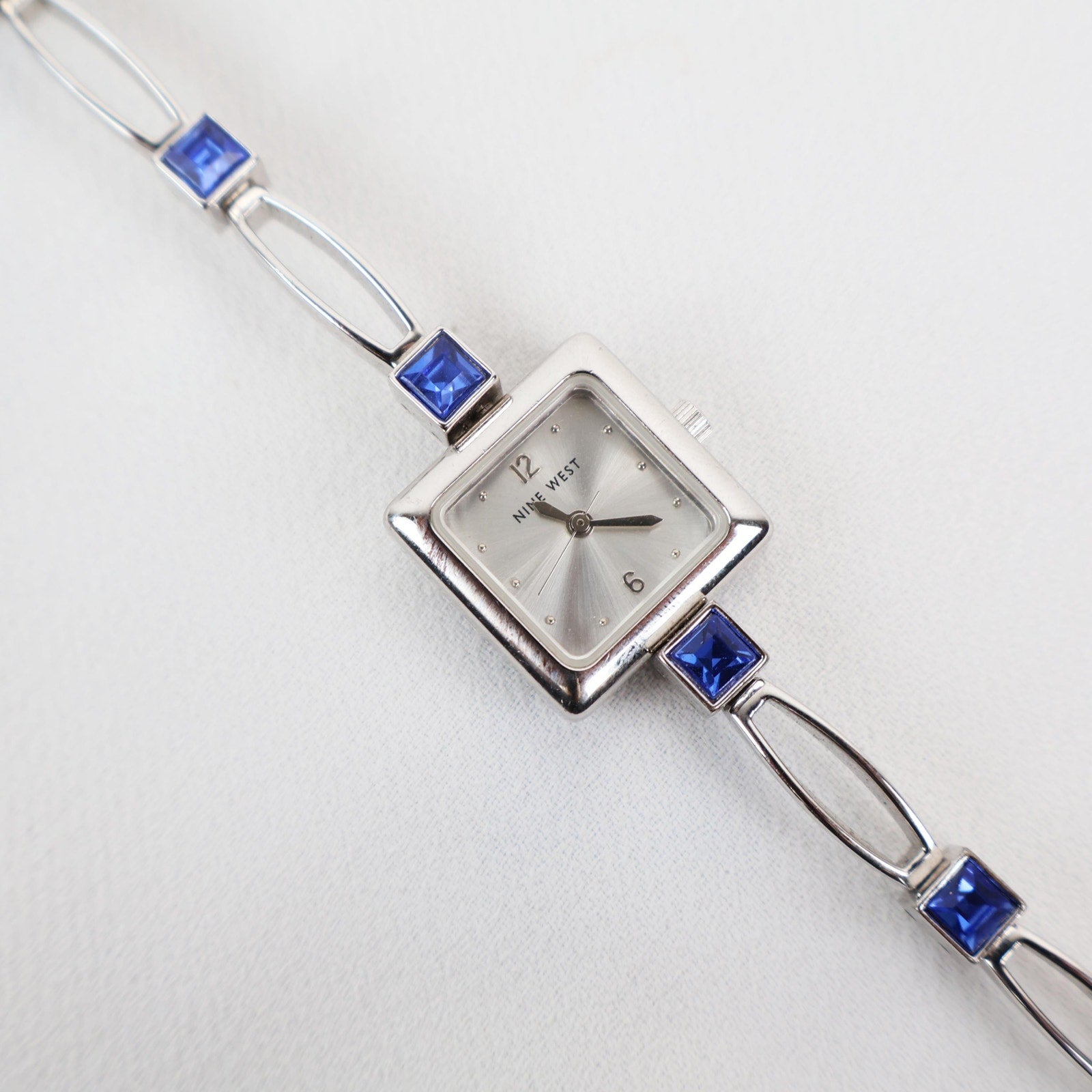 Vintage Silver Nine West Bracelet Watch with Blue Gem Embellishments