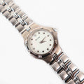Vintage Silver Tone Bulova Watch with Round White Watch Face