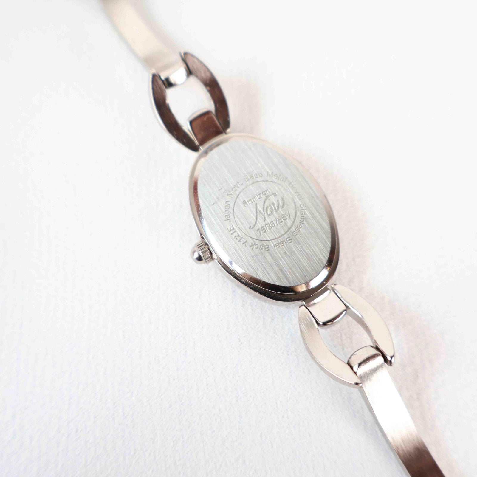 Vintage Silver Armitron Watch with Pink Oval Face, Japanese Movement
