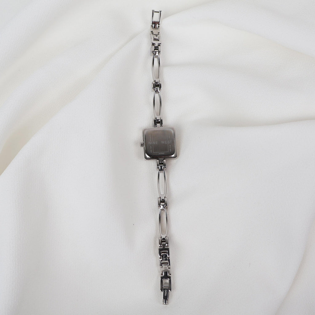 Vintage Silver Nine West Bracelet Watch with Blue Gem Embellishments