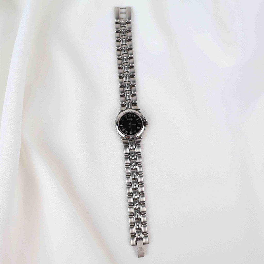 Vintage Silver Tone Bulova Watch with Round Black Watch Face