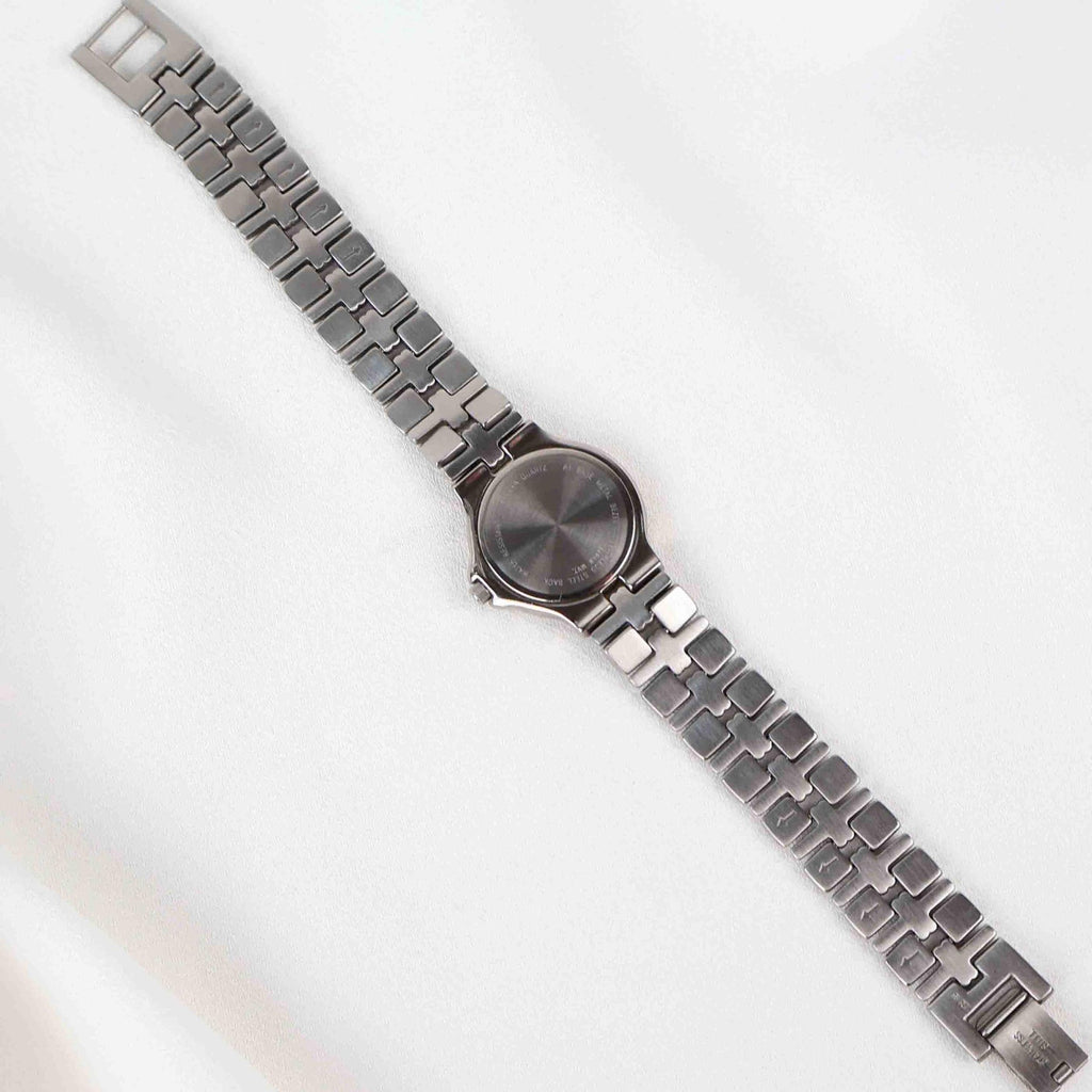 Vintage Silver Tone Bulova Watch with Round White Watch Face