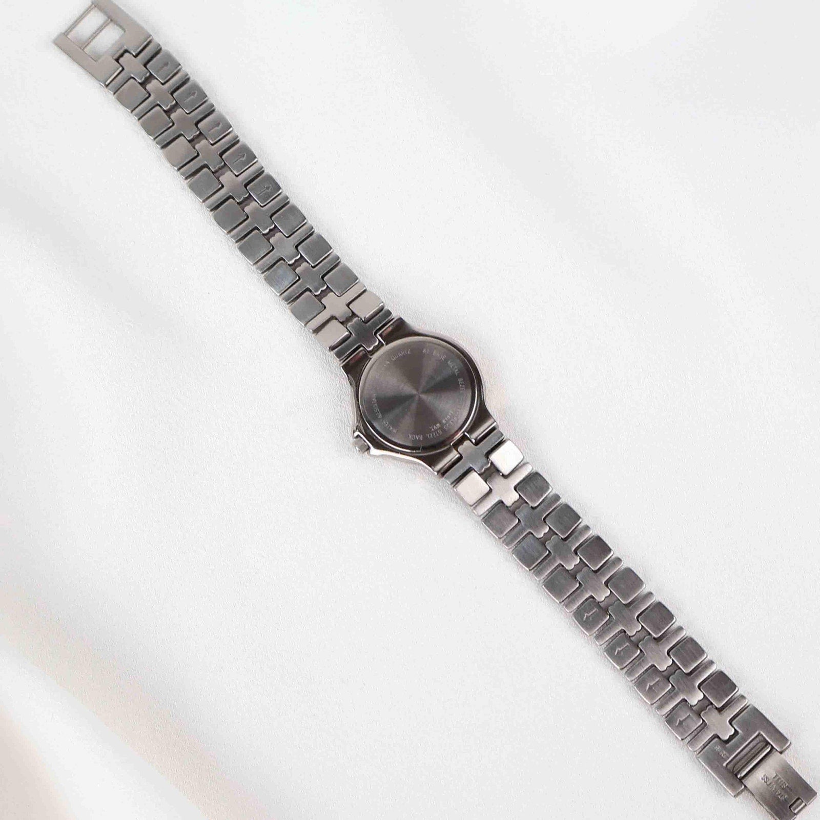 Vintage Silver Tone Bulova Watch with Round White Watch Face