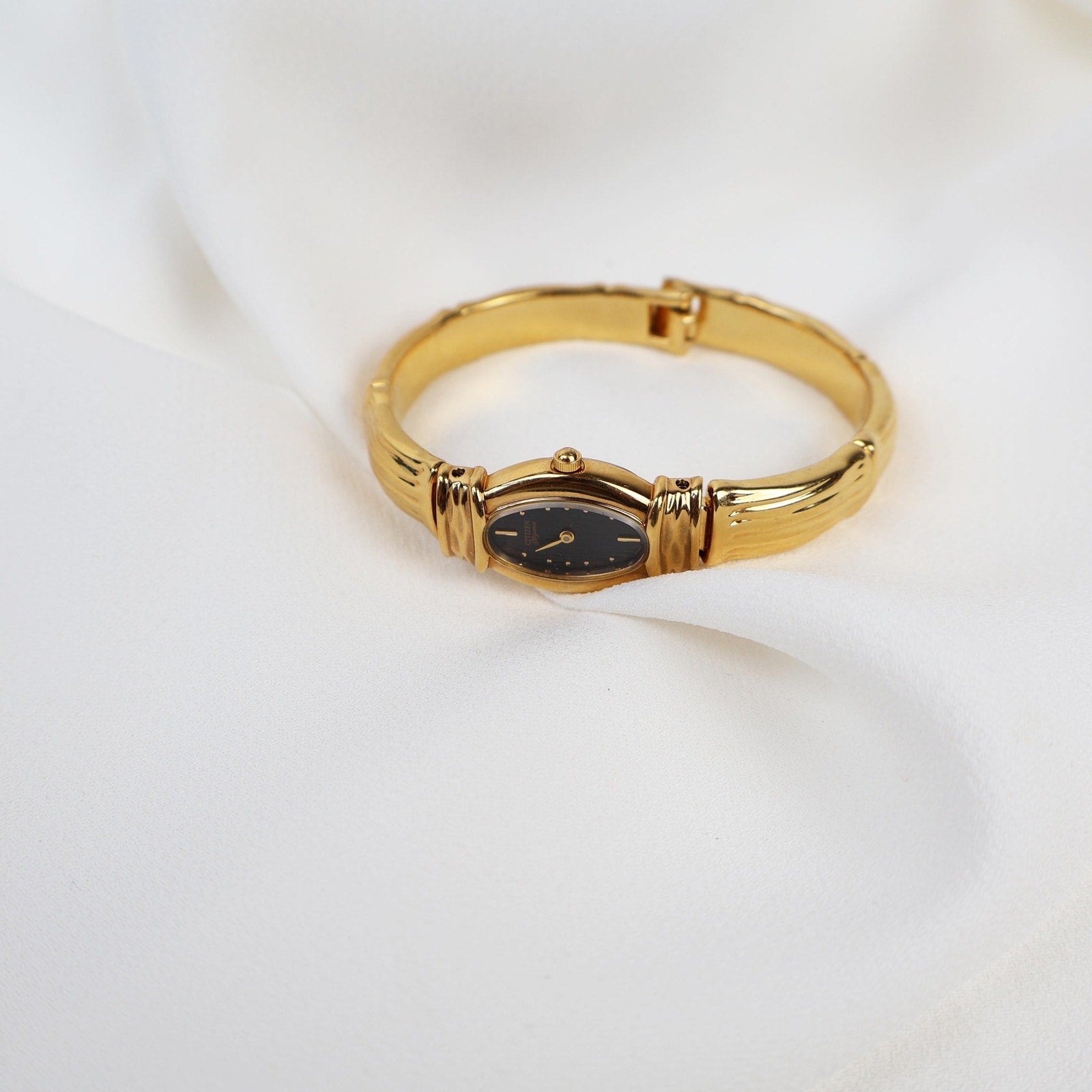 Vintage Black and Gold Citizen Cuff Watch