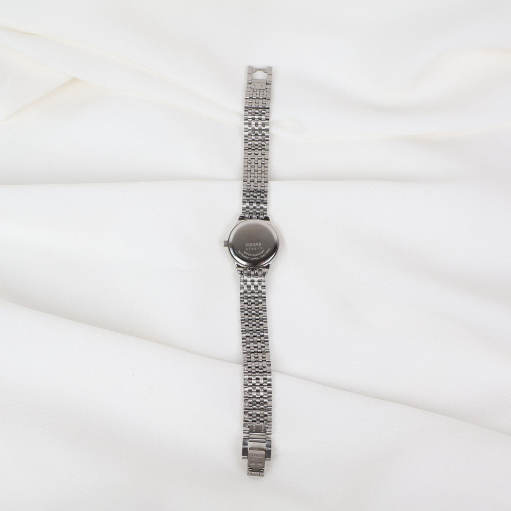 Vintage Silver Pulsar Watch with a Round Face