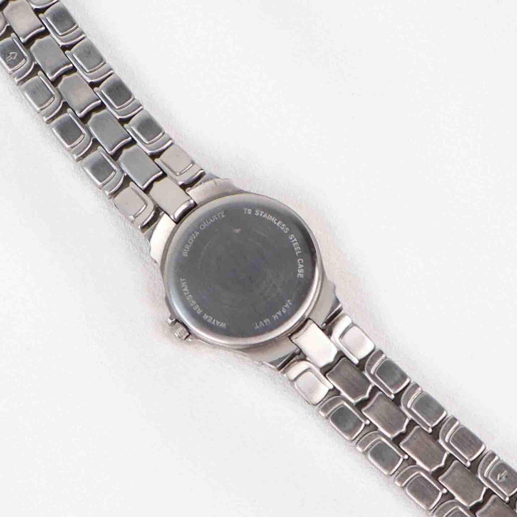 Vintage Silver Tone Bulova Watch with Round Black Watch Face