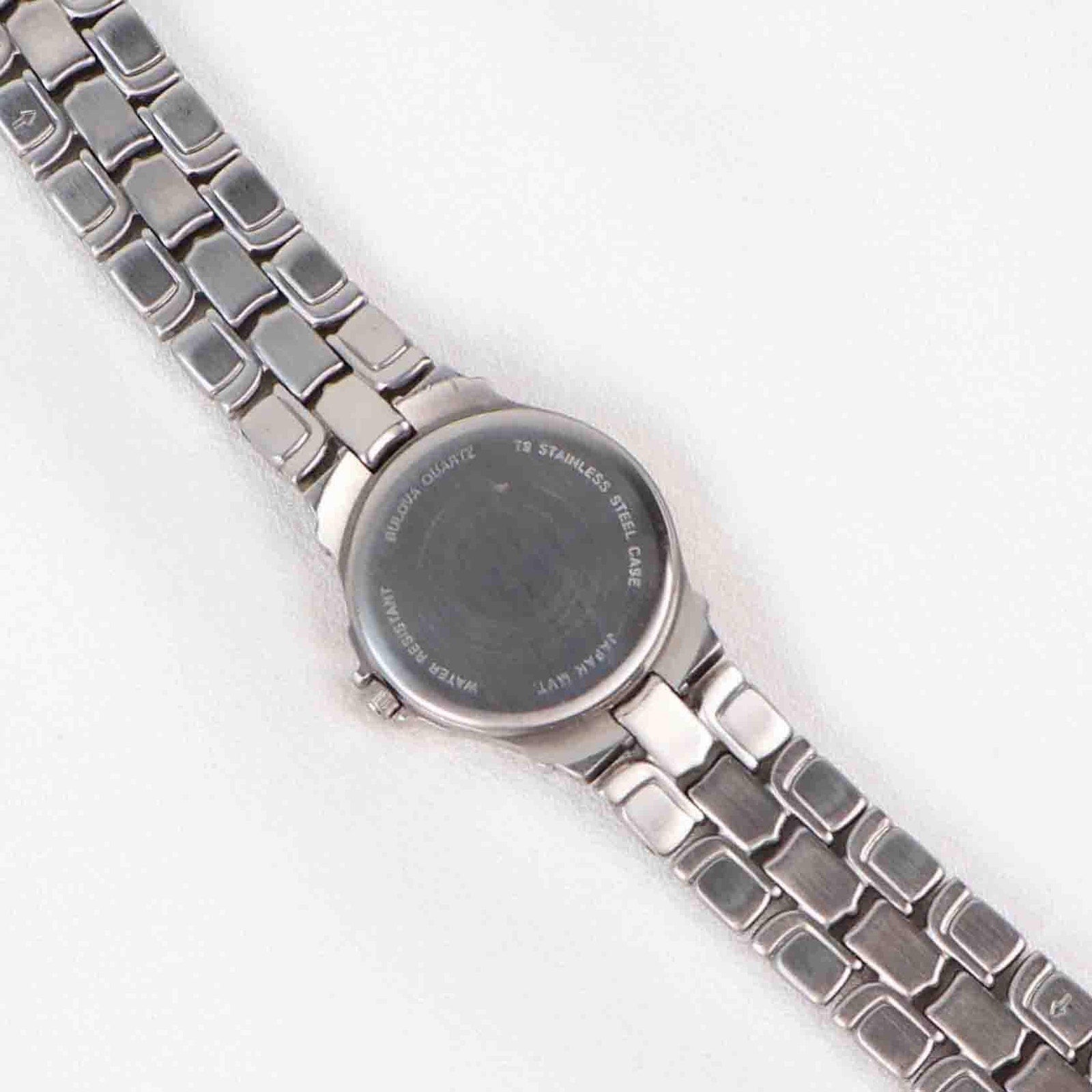 Vintage Silver Tone Bulova Watch with Round Black Watch Face
