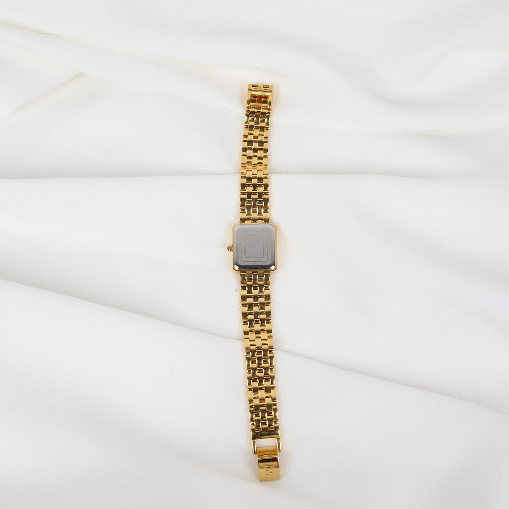 Vintage Gold Christian Gold Watch with a Rectangle Face