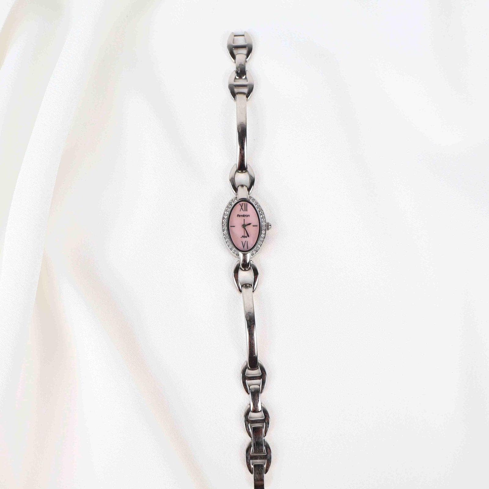 Vintage Silver Armitron Watch with Pink Oval Face, Japanese Movement