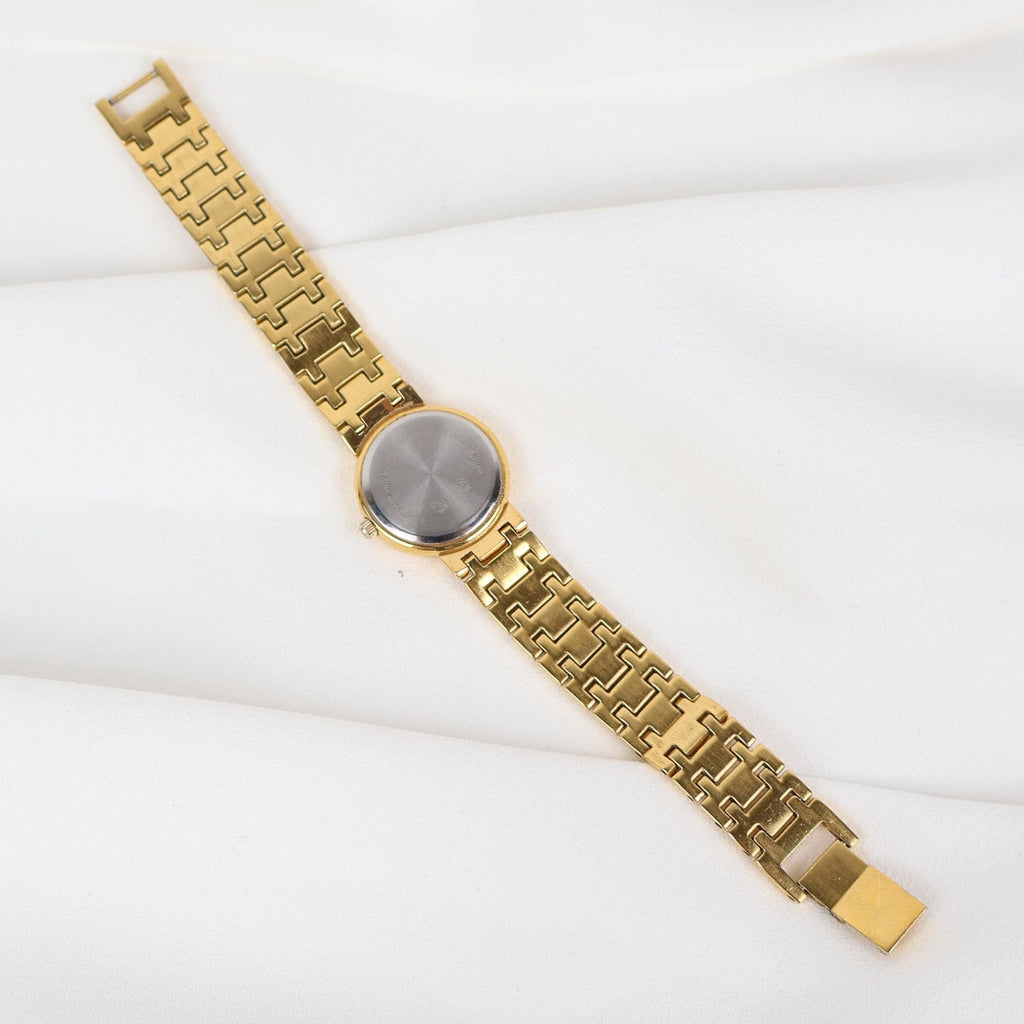 Vintage Gold Tone Pulsar Watch with a Circle Face