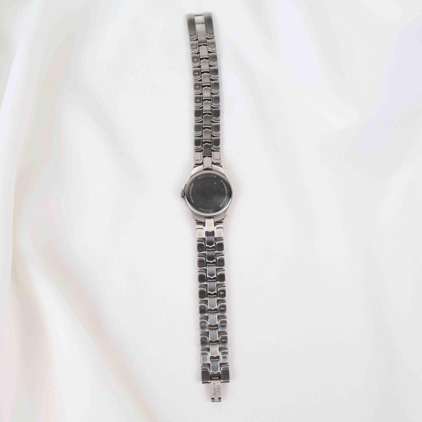 Vintage Silver Tone Bulova Watch with Round Black Watch Face