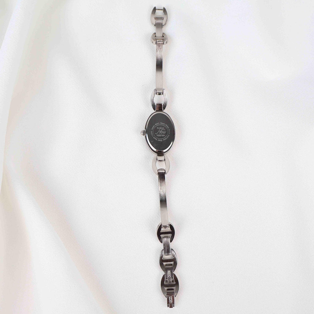 Vintage Silver Armitron Watch with Pink Oval Face, Japanese Movement