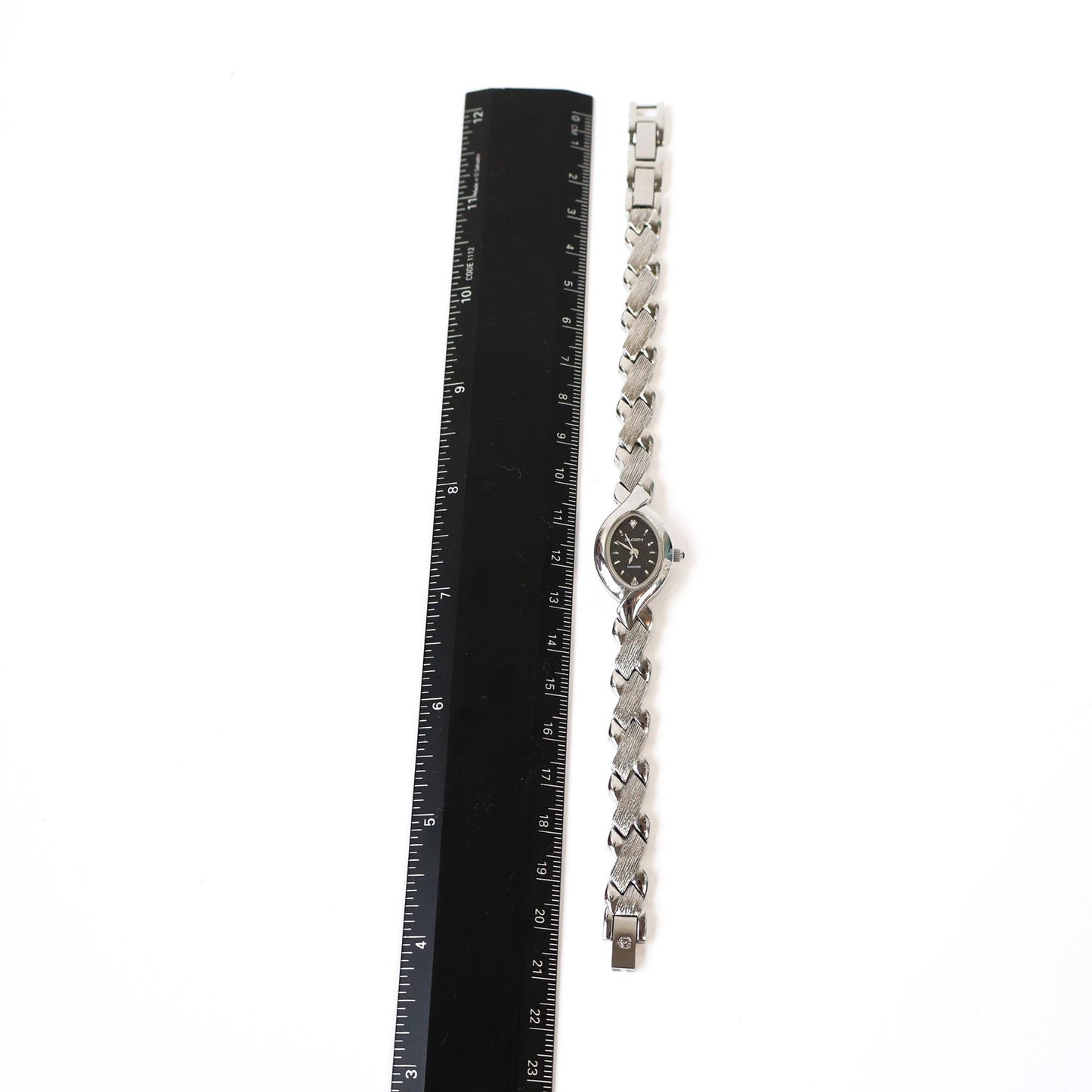 Vintage Silver Watch with Black Oval Face | ELGIN