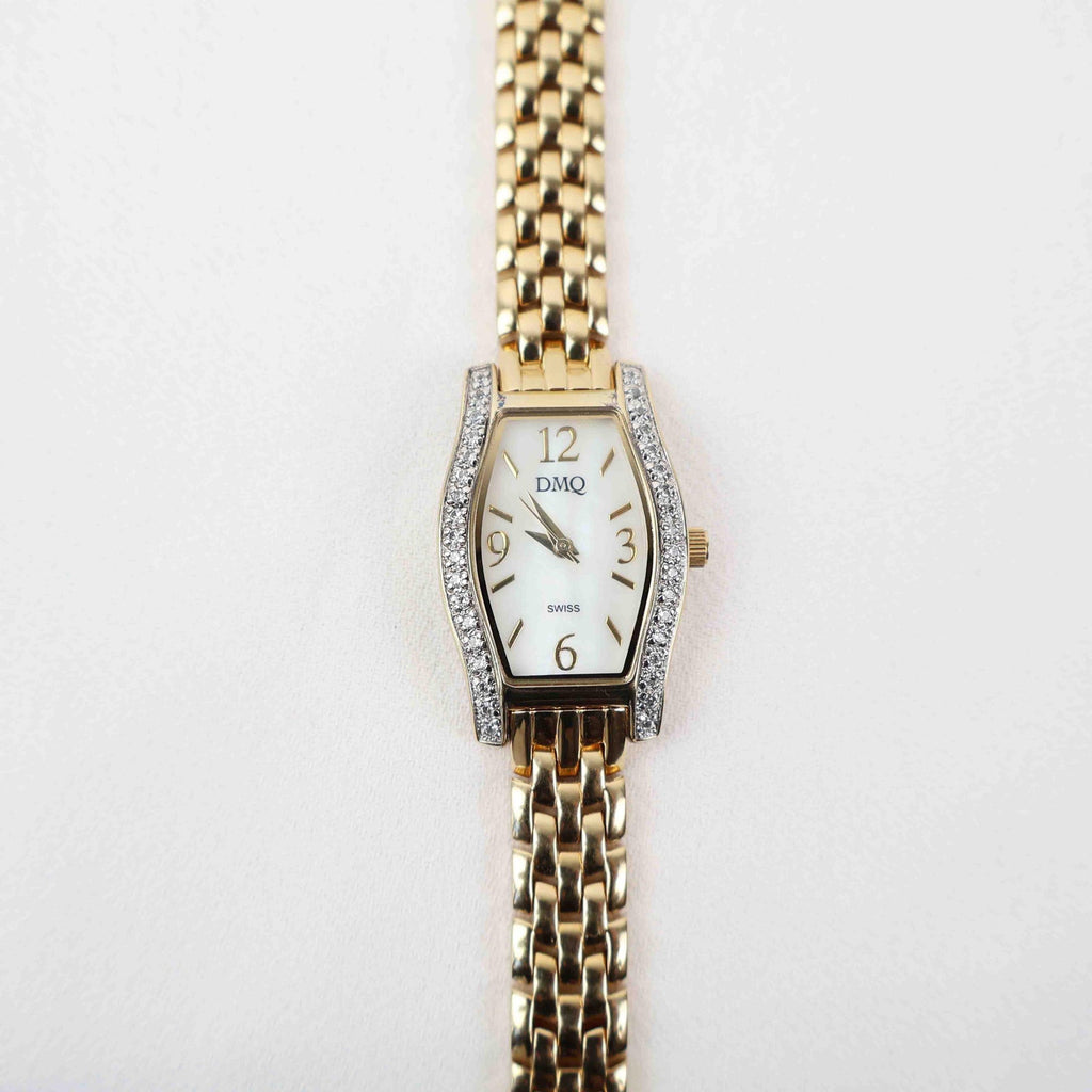 Vintage DMQ Oval Face Watch – Gold Tone Bracelet (Working Battery)