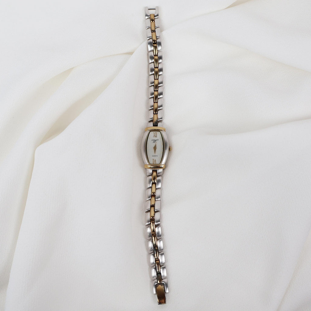 Vintage Two Tone Worthington Watch with a Rectangle/ Oval Face