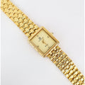 Vintage Gold Christian Gold Watch with a Rectangle Face