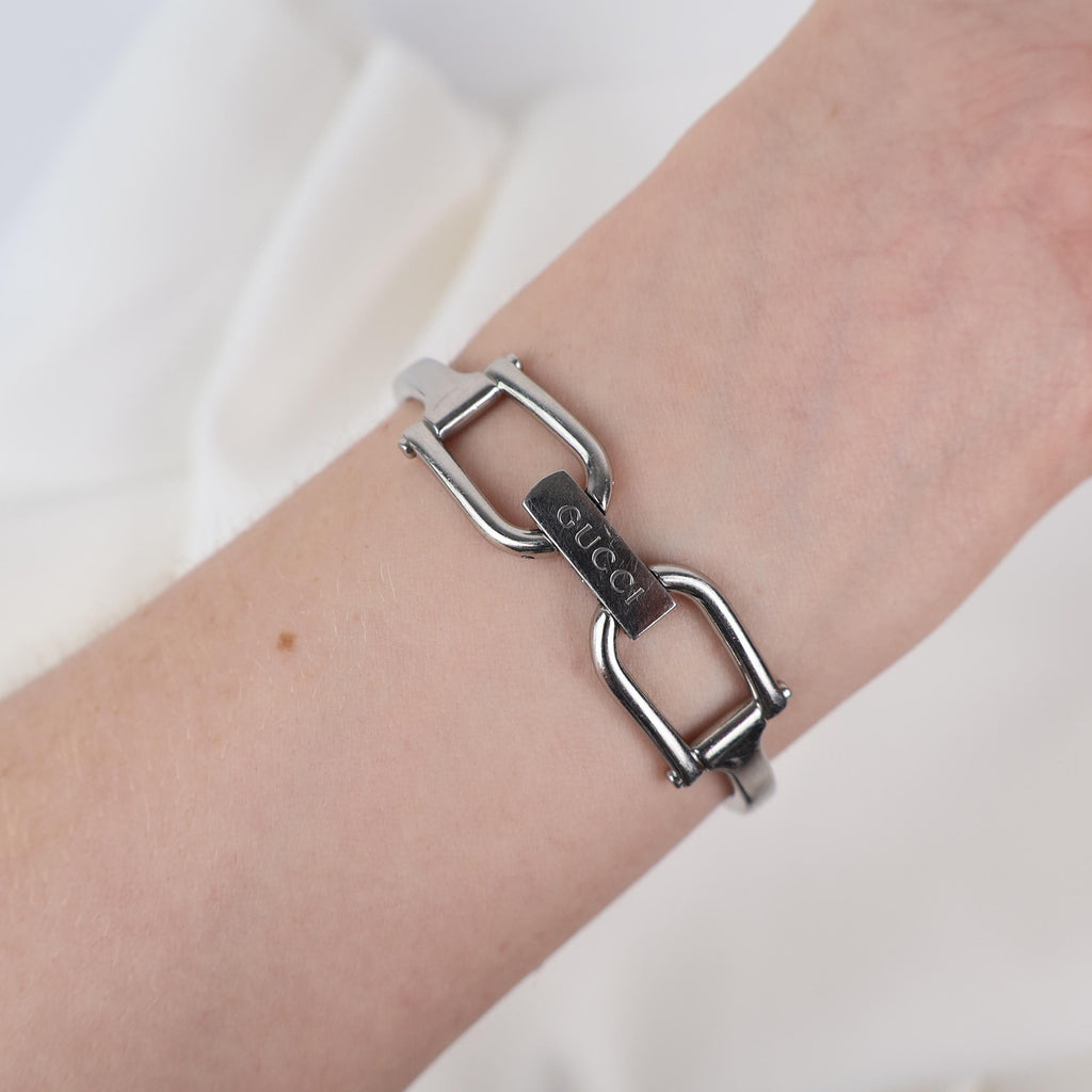 Vintage Silver Gucci Horse-Bit Watch with a Pink Opalesent Face