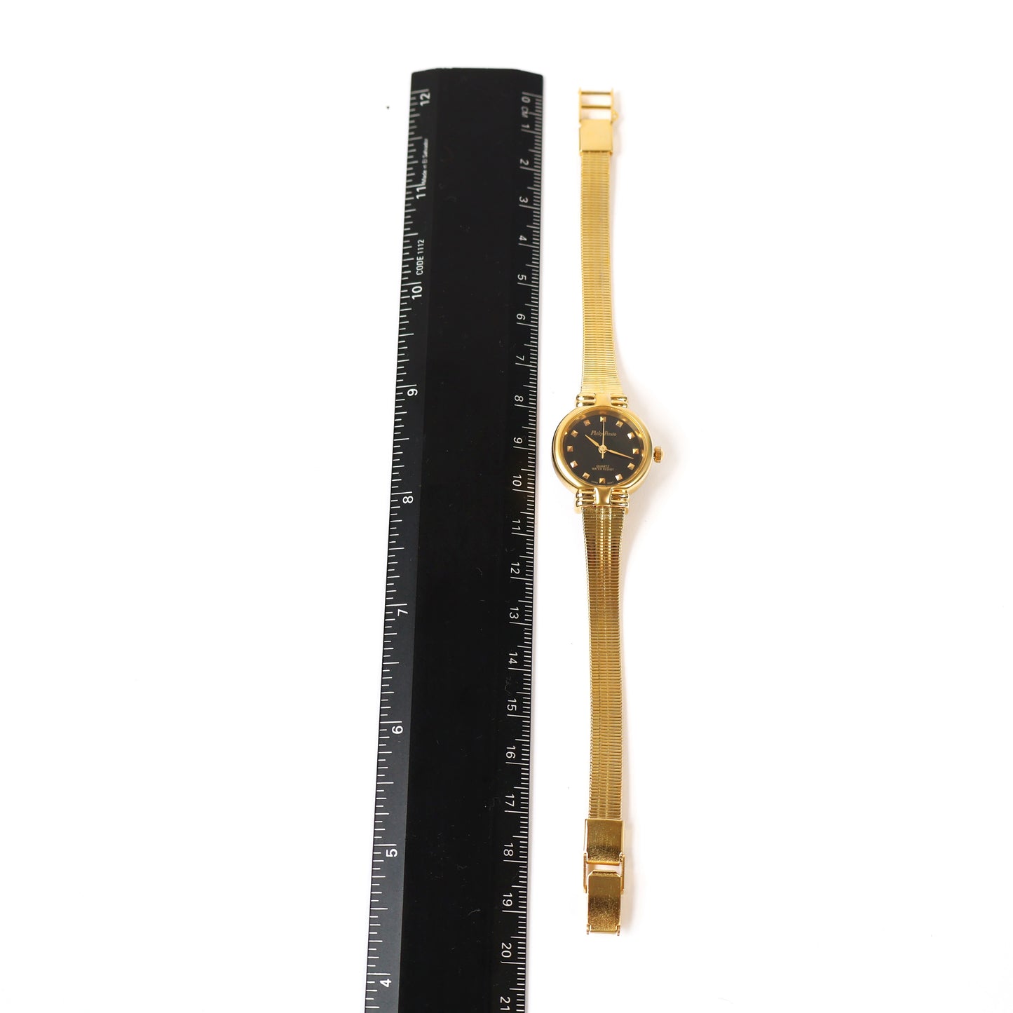 Vintage Gold Watch with Black Round Face | Philip Persio