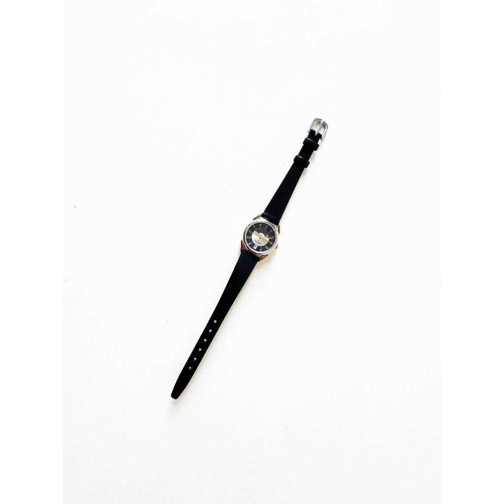 Vintage Leather Watch with Black Band and Silver Details and Sky | Peugeot