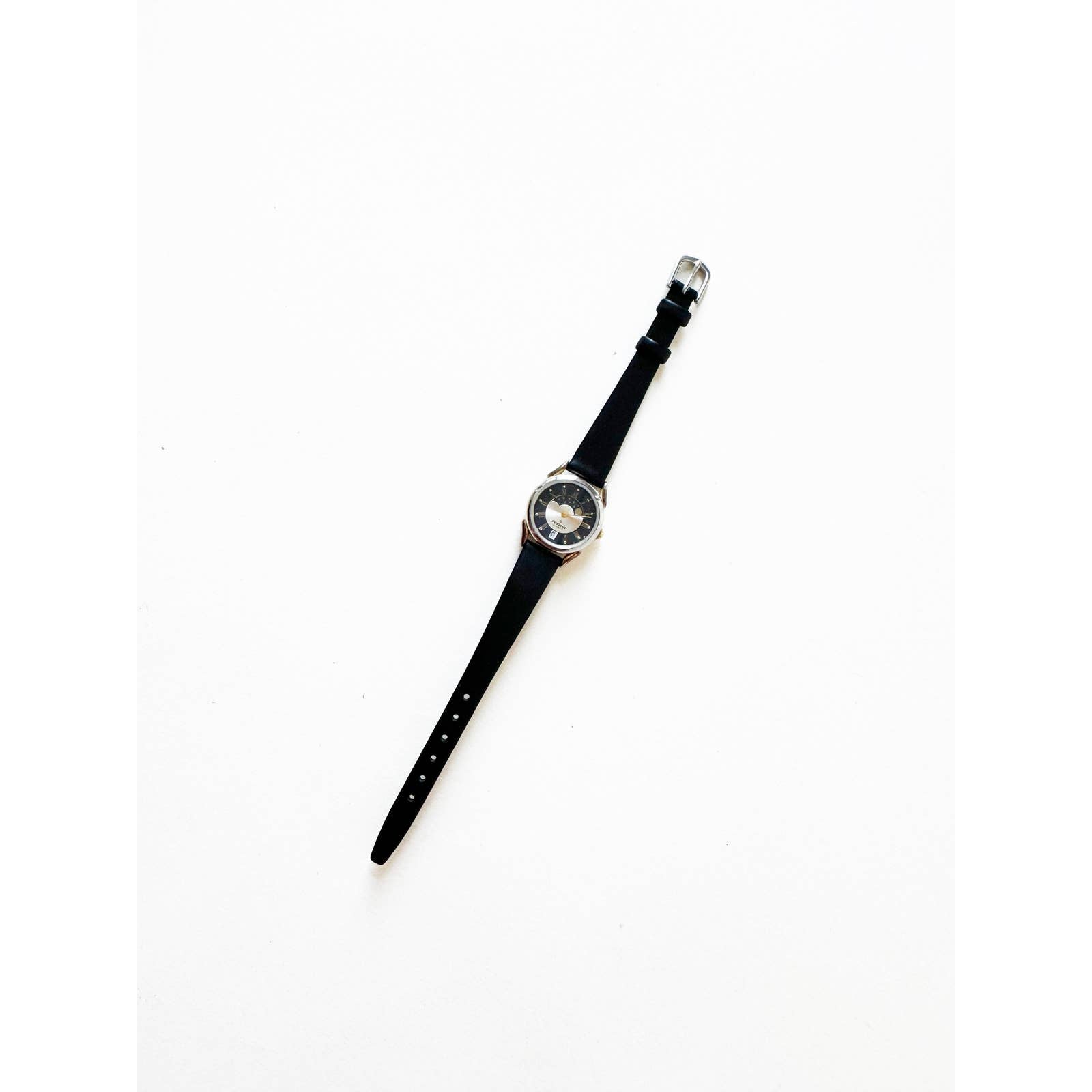 Vintage Leather Watch with Black Band and Silver Details and Sky | Peugeot