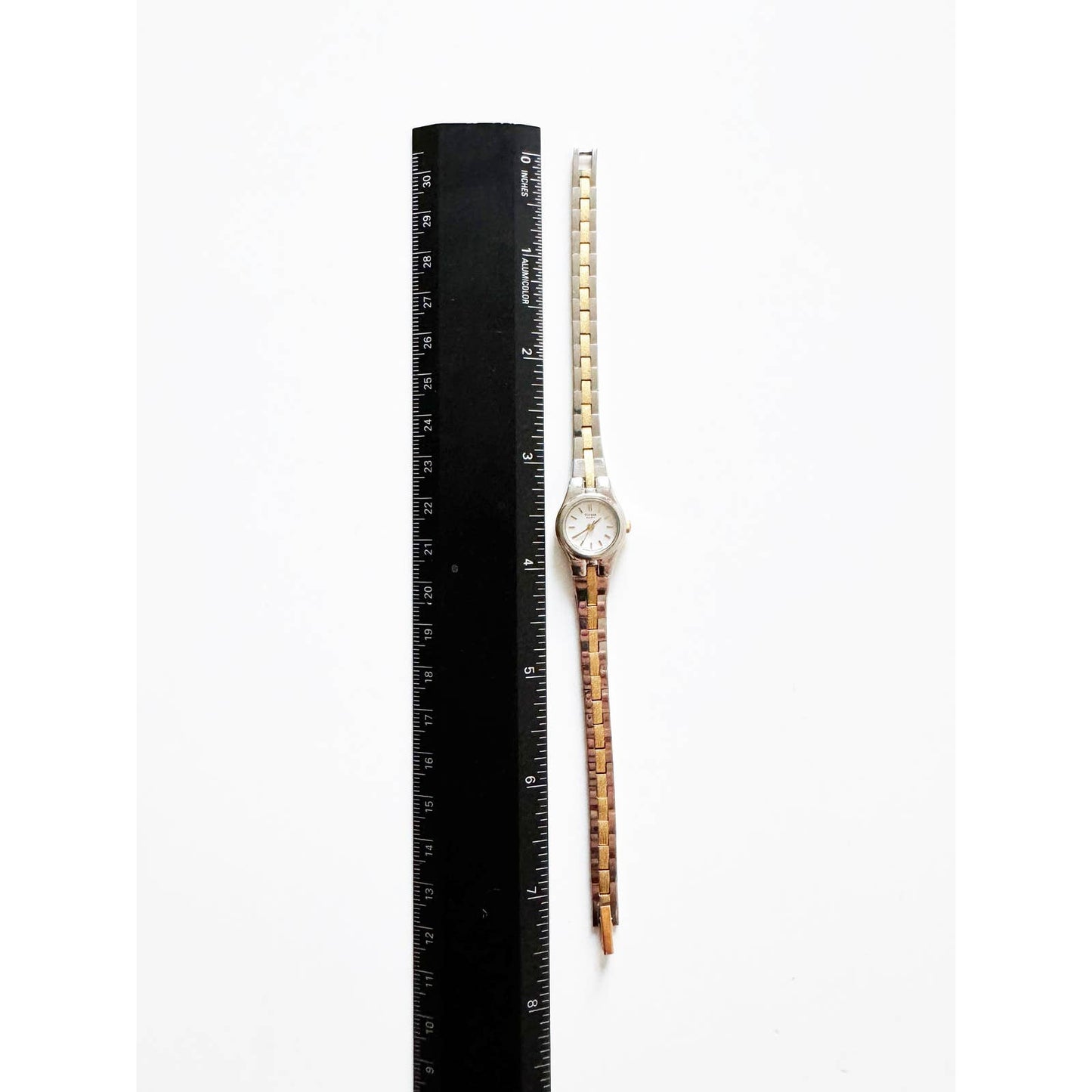 Vintage Small Two Tone Watch with Circular Face | Pulsar