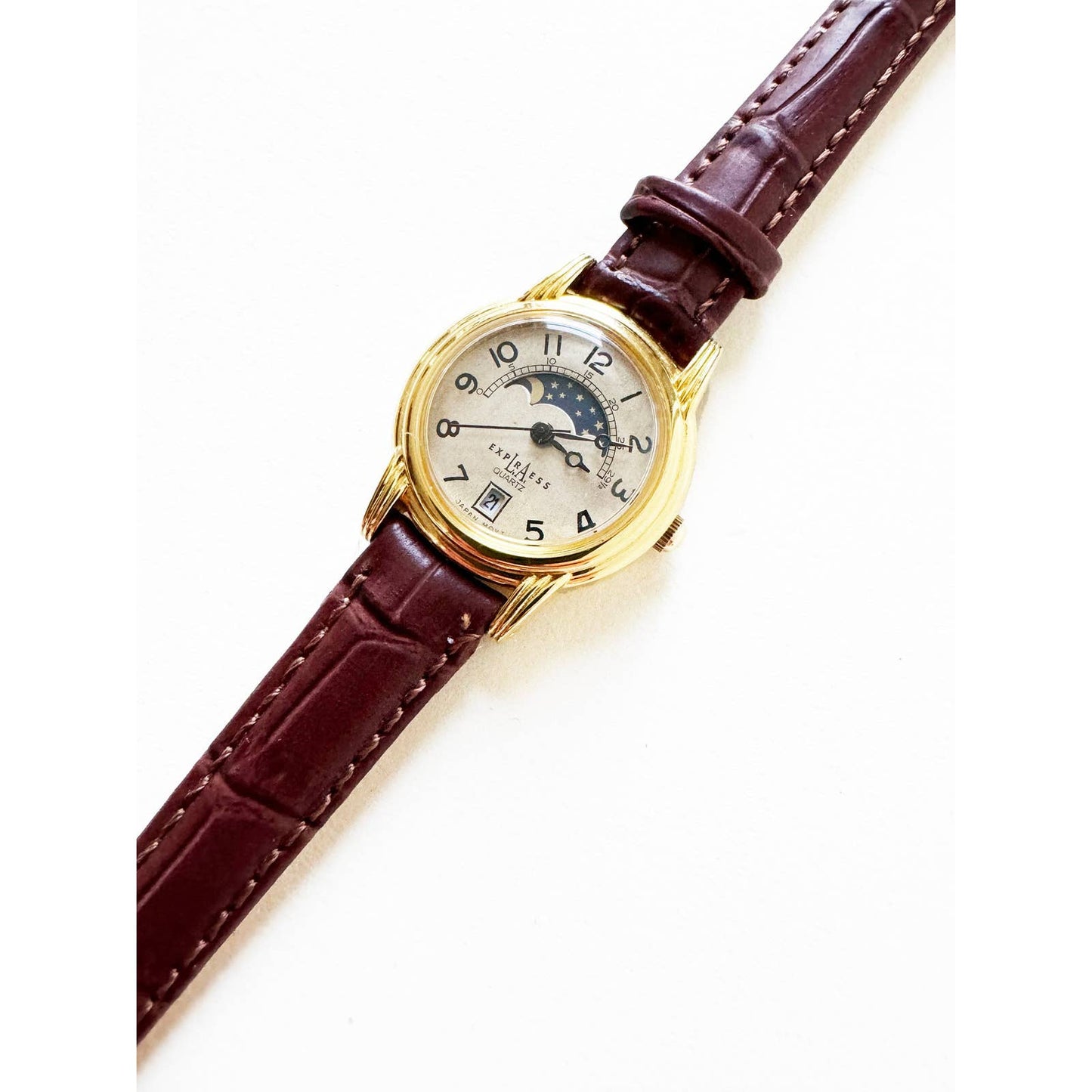 Vintage Leather Watch with Brown Band and Gold Details and Sky no