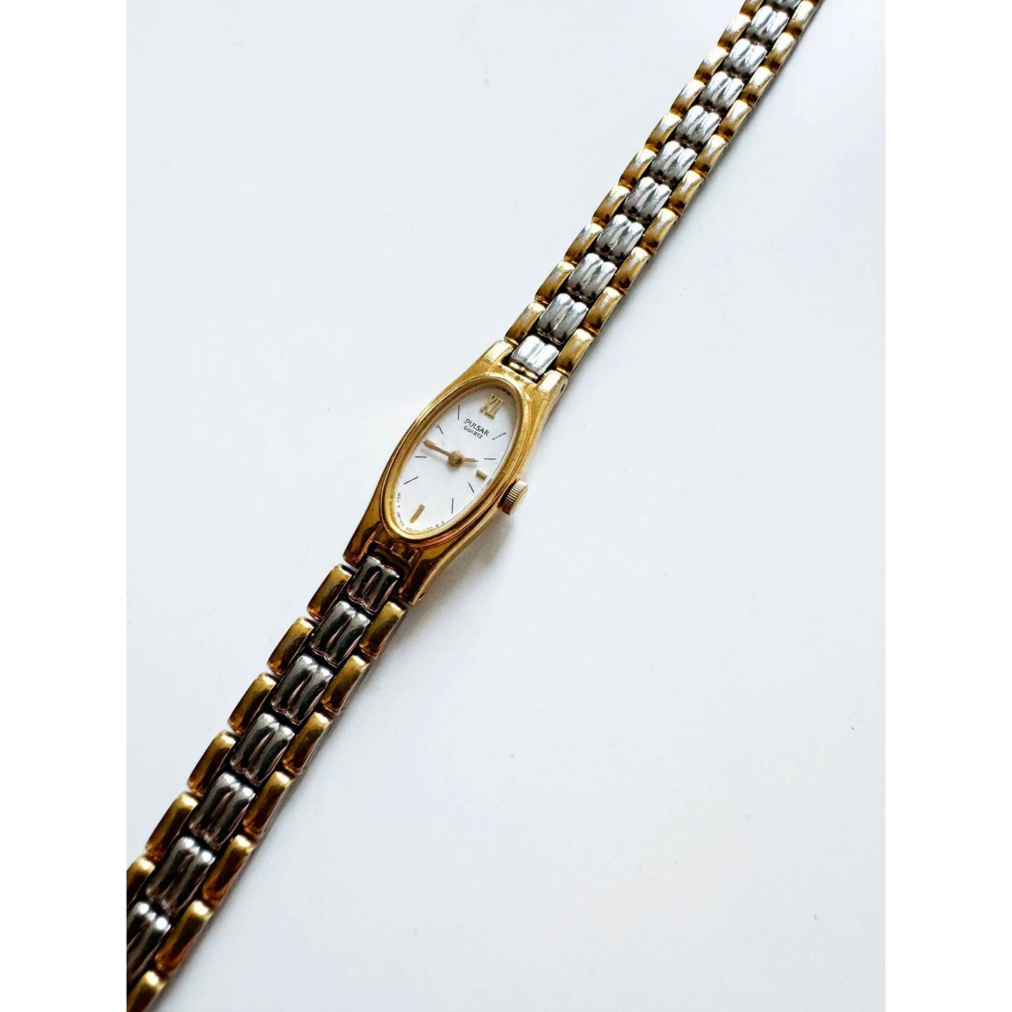 Vintage Small Two Tone Watch with Oval Face | Pulsar