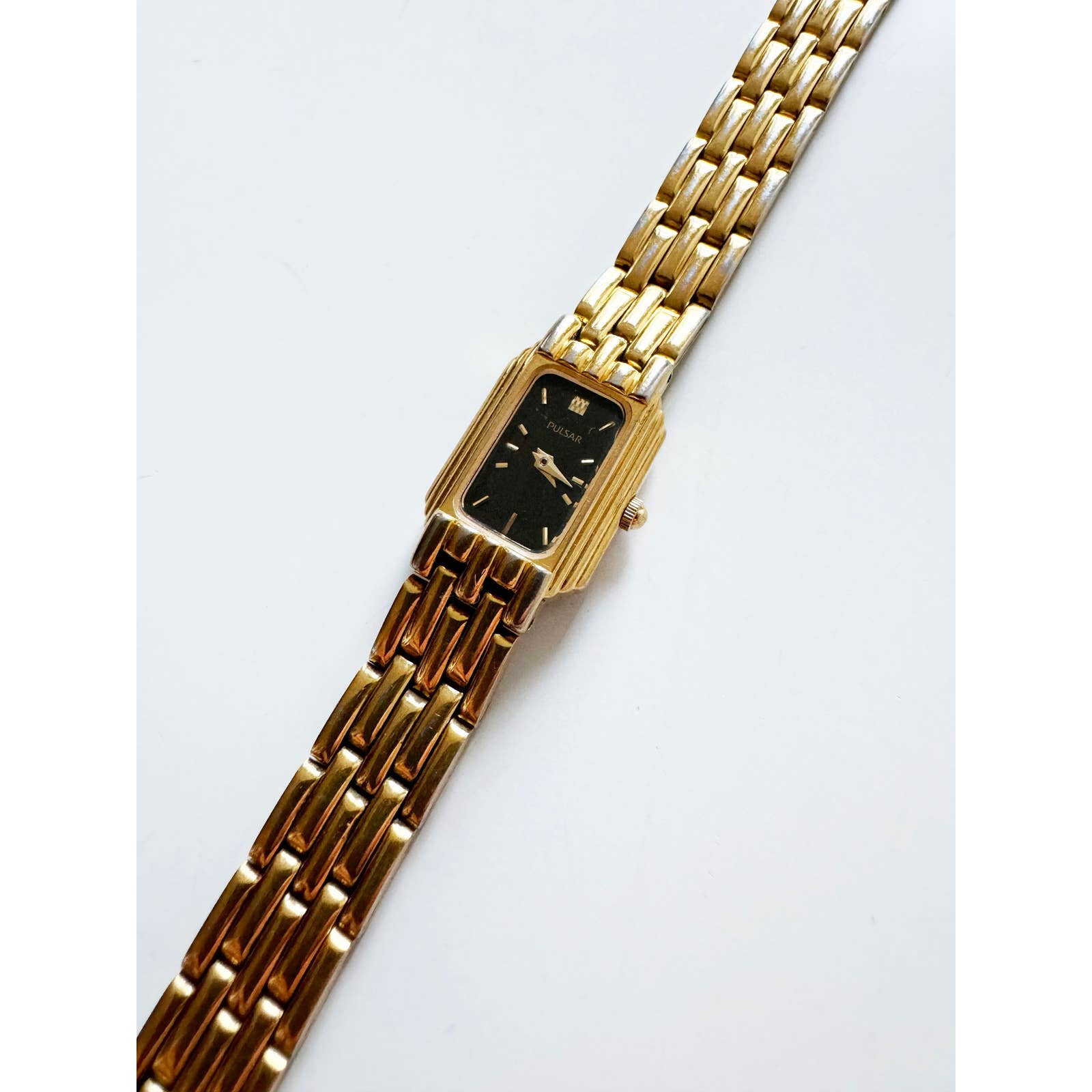 Vintage 90s Small Black and Gold Watch with Rectangular Face | Pulsar