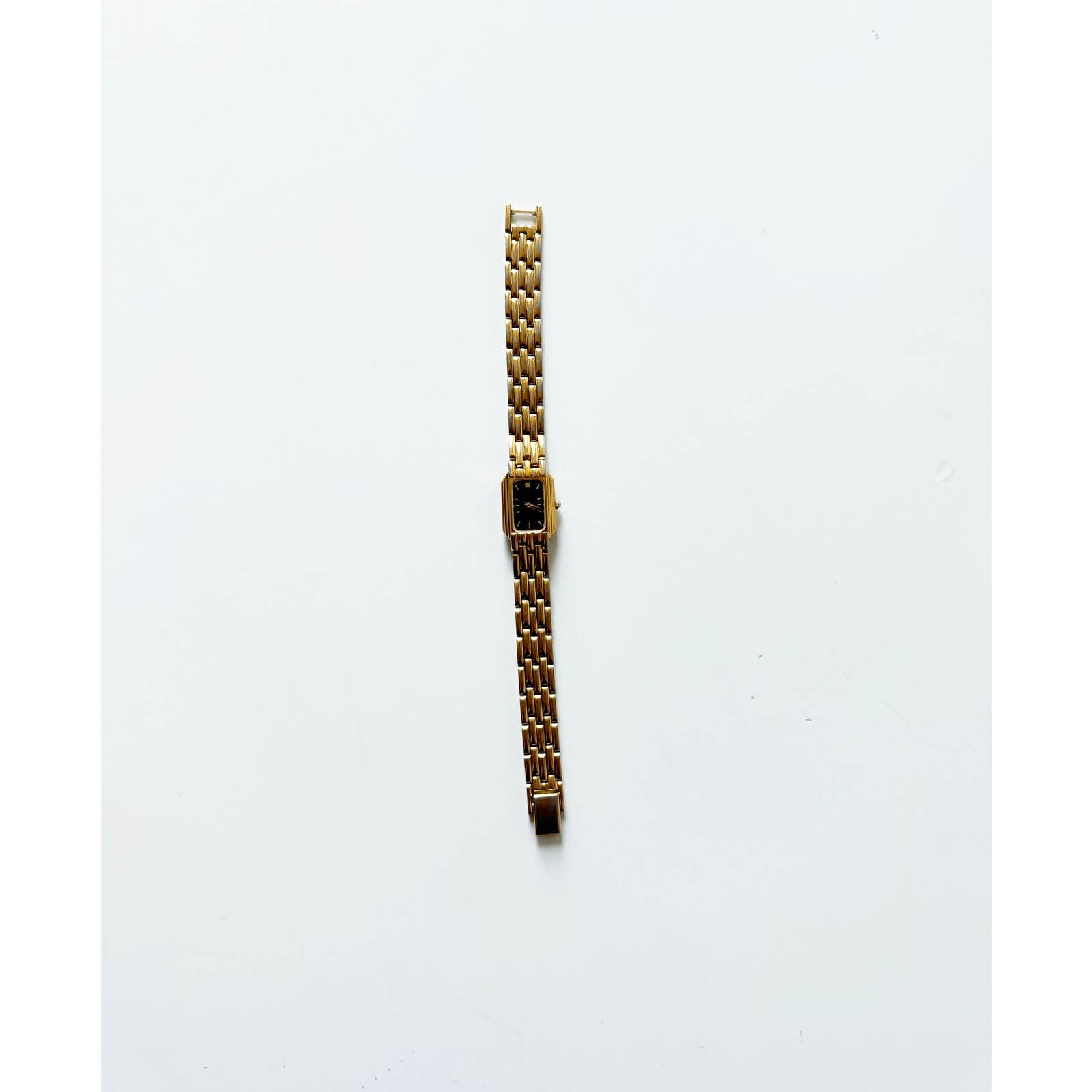 Vintage 90s Small Black and Gold Watch with Rectangular Face | Pulsar
