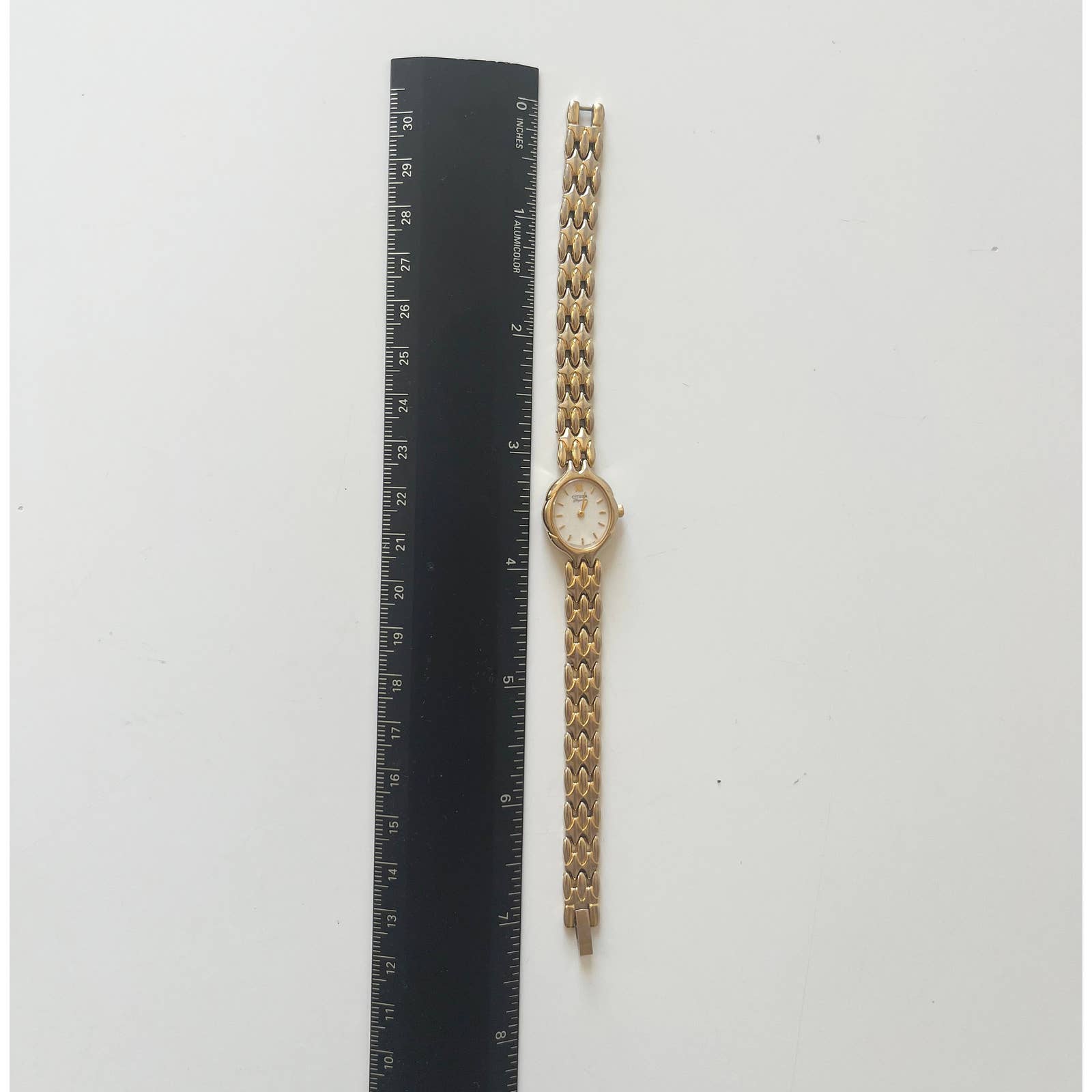 Vintage 90s Small Gold Watch with White Face | Citizen