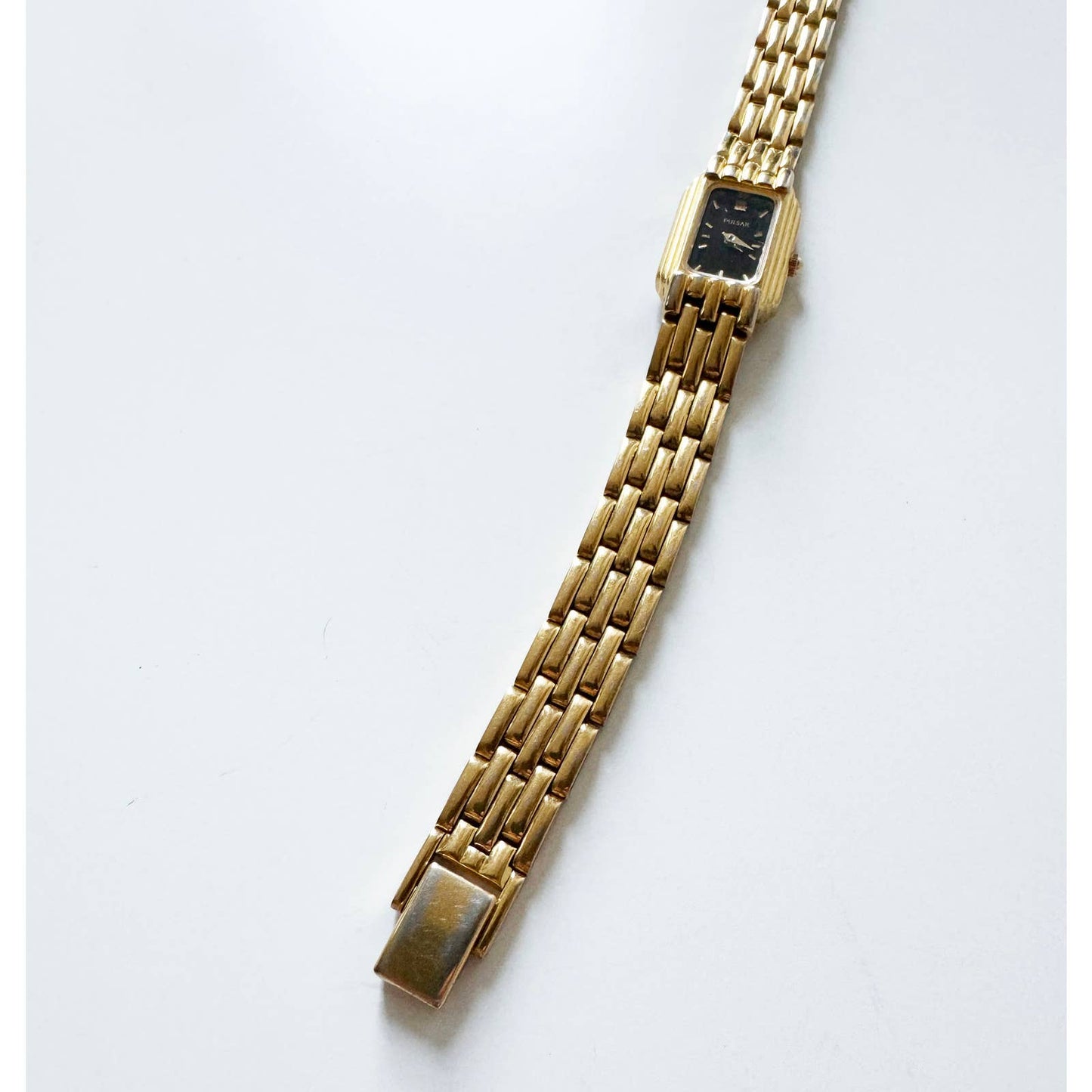 Vintage 90s Small Black and Gold Watch with Rectangular Face | Pulsar